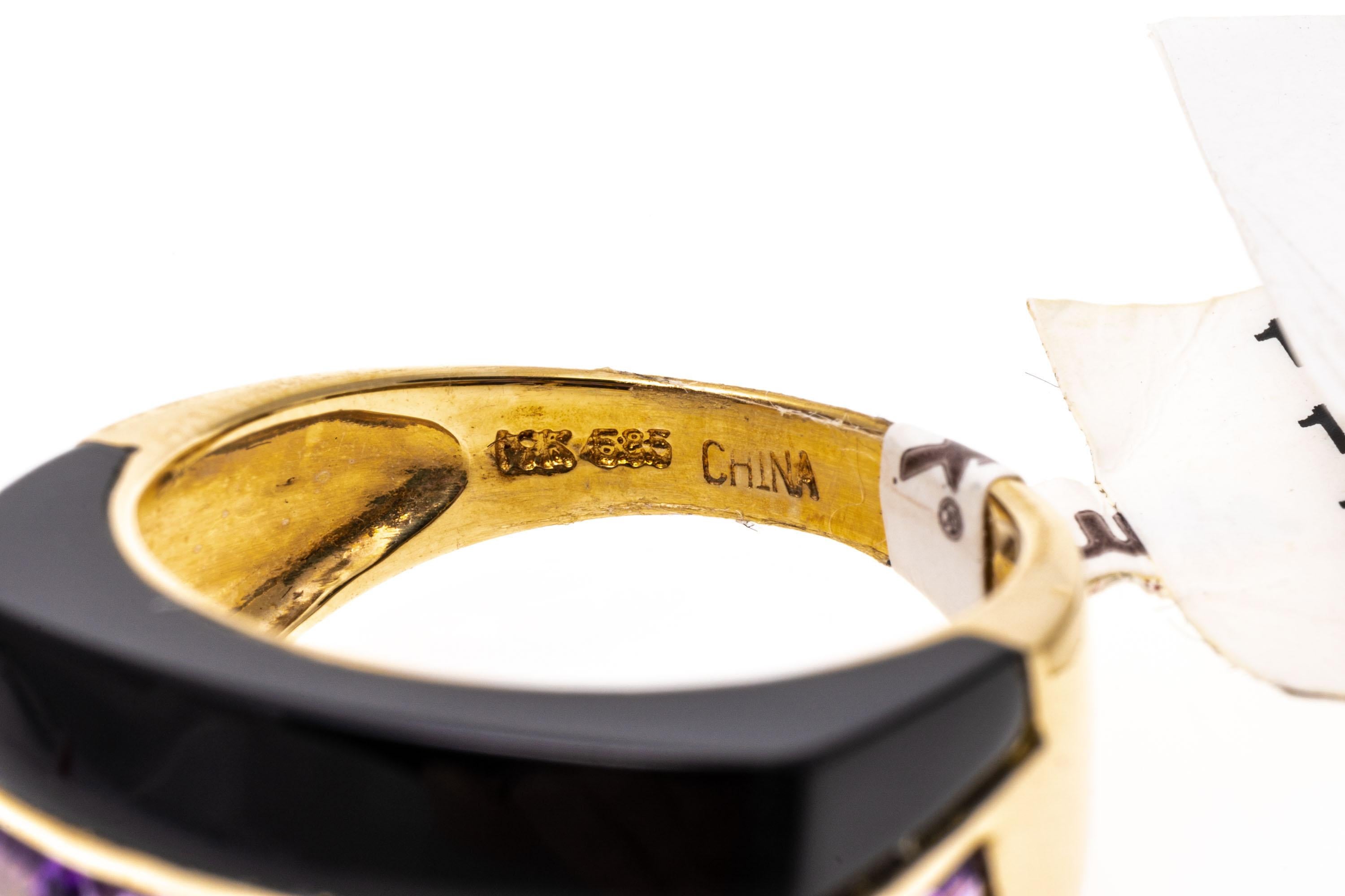 Zeitgenössischer horizontaler Ring aus 14 Karat Gelbgold mit schwarzem Onyx und Amethyst (Smaragdschliff) im Angebot