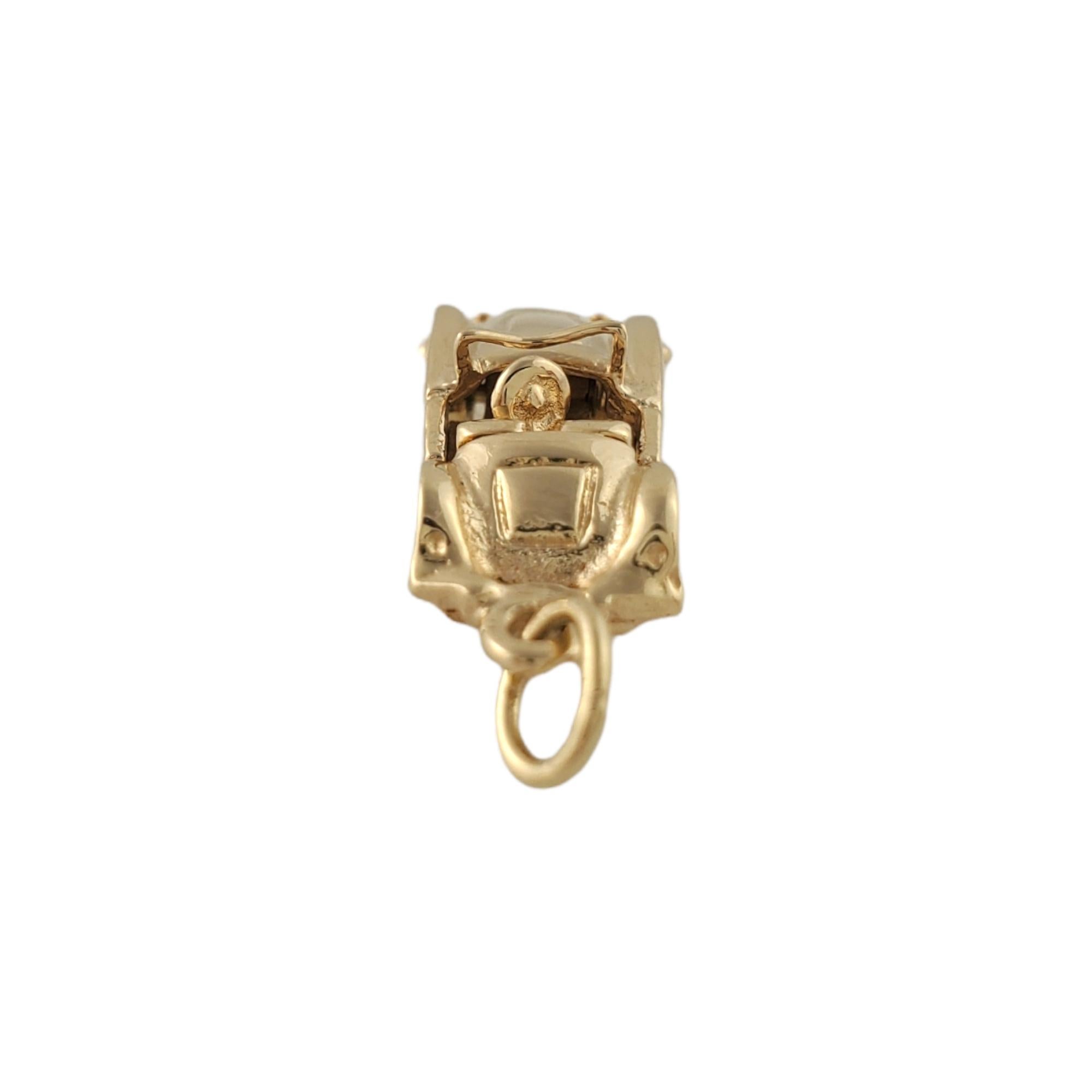 14K Yellow Gold Convertible Car Charm

This lovely convertible car charm features articulating car wheels in 14K yellow gold.

Size: 22 mm X 9 mm

Weight: 3.4 g/ 2.1 dwt

Hallmark: 14K

Very good condition, professionally polished.

Will come