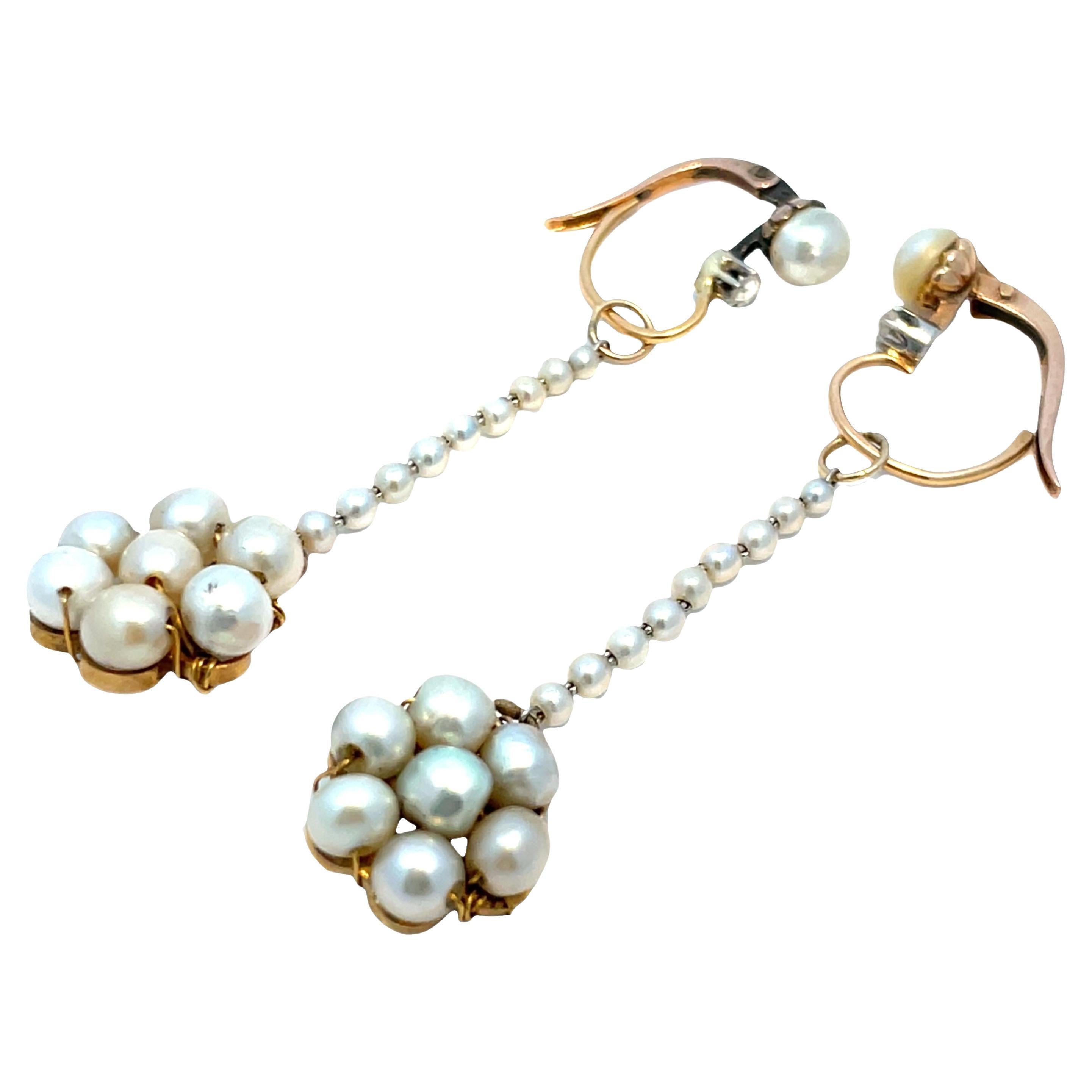 Boucles d
oreilles jour/nuit convertibles en or jaune 14k avec perles et diamants