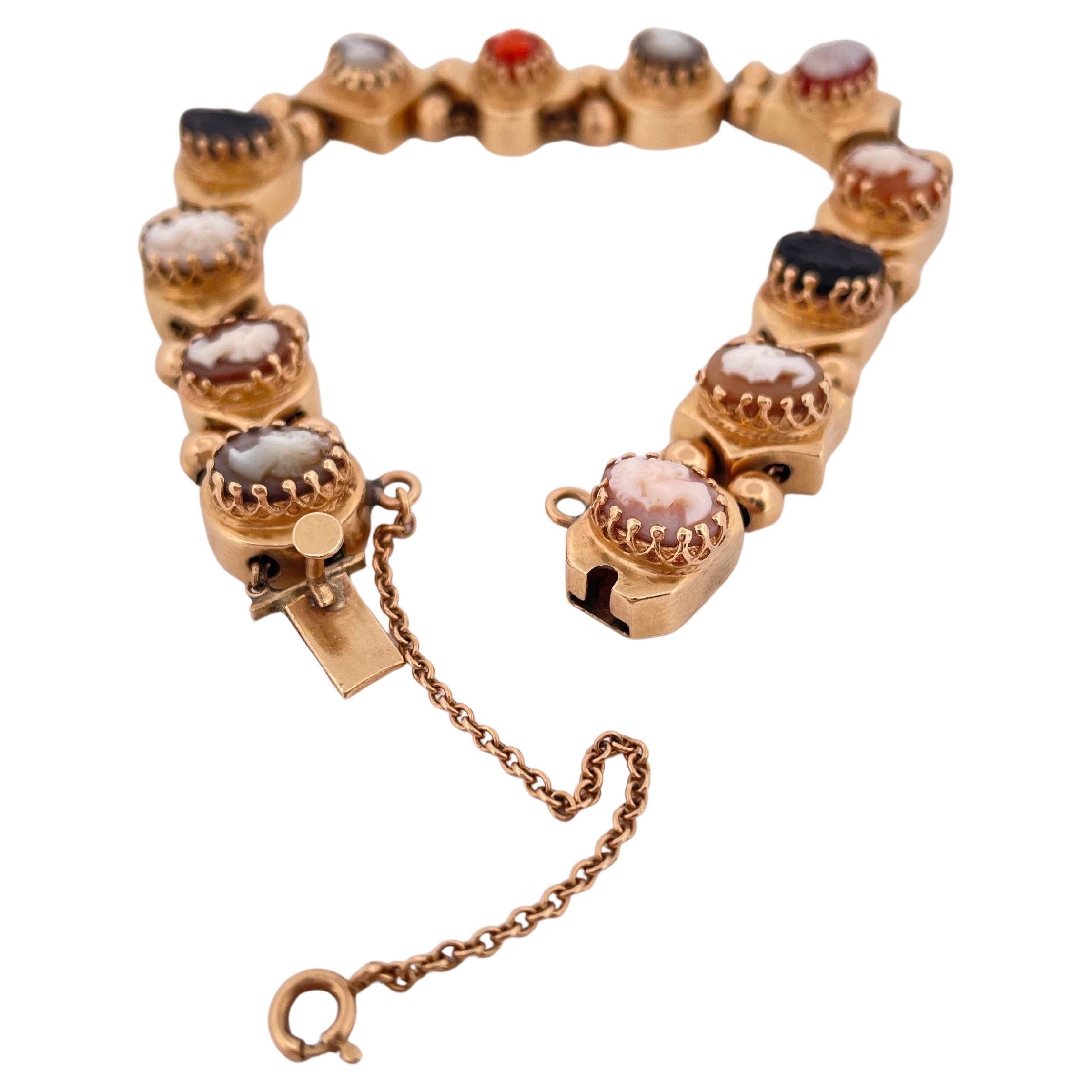 Oval Cut 14k Yellow Gold Coral, Onyx, And Shell Slide Cameo Bracelet For Sale