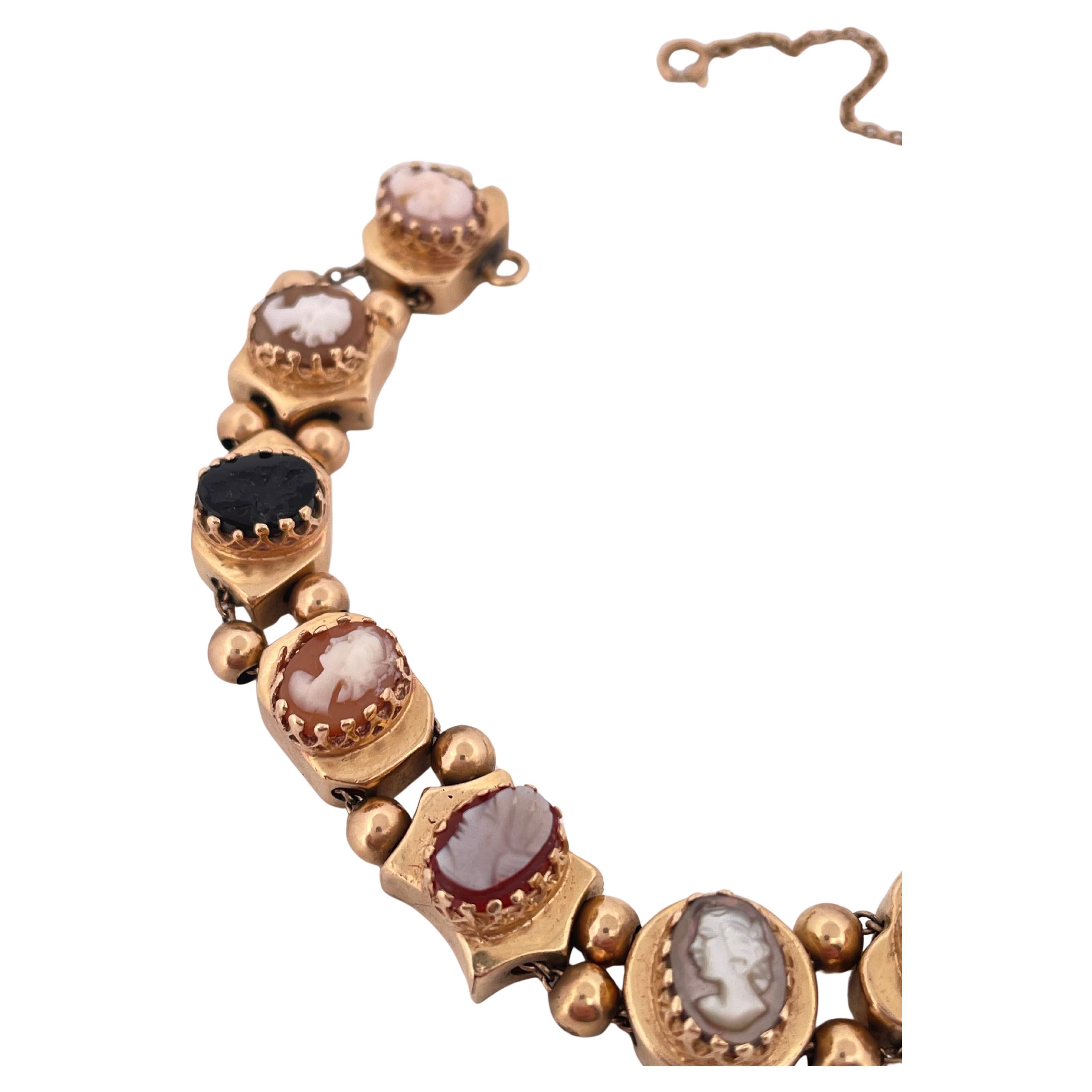 14k Yellow Gold Coral, Onyx, And Shell Slide Cameo Bracelet In Good Condition For Sale In Sewickley, PA
