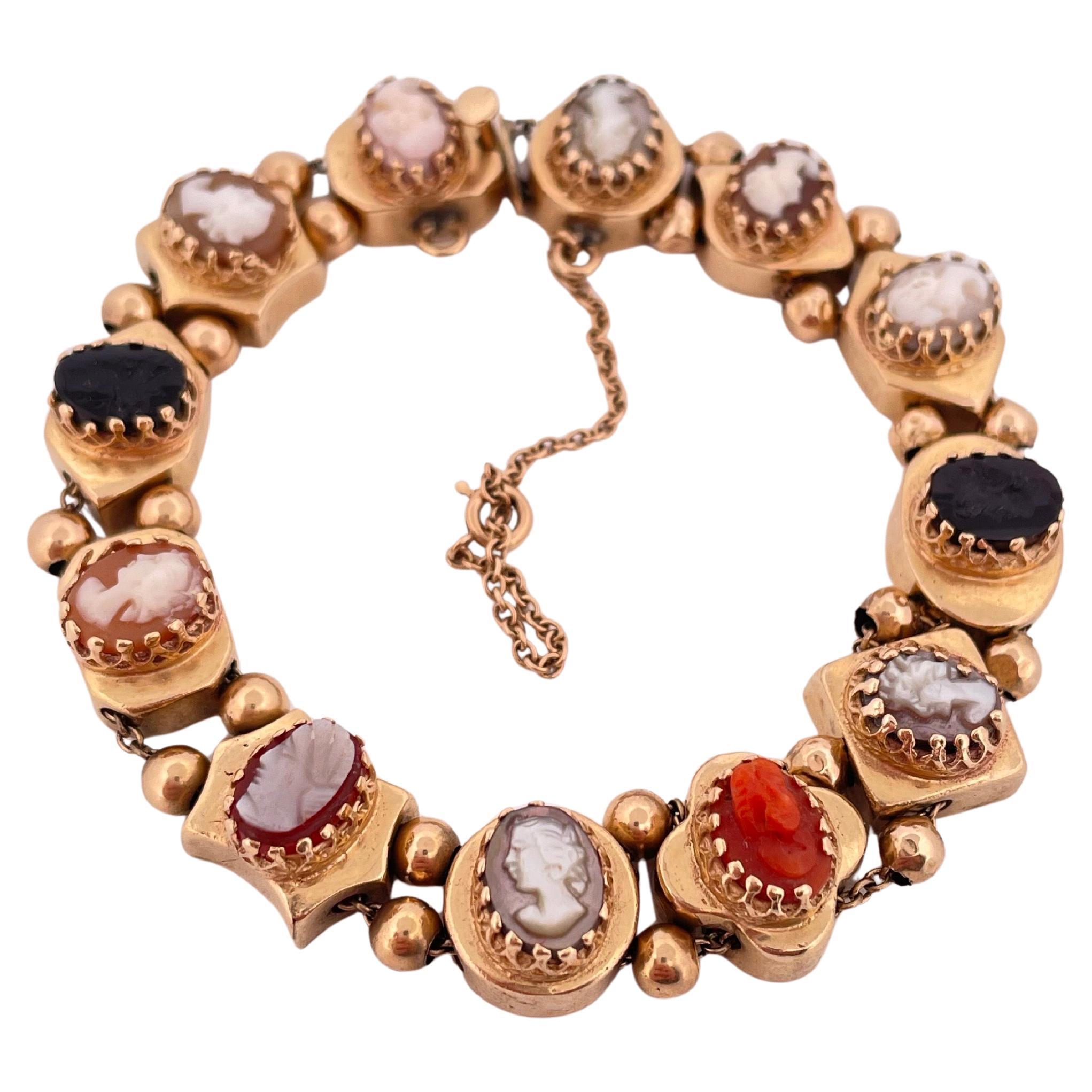 14k Yellow Gold Coral, Onyx, And Shell Slide Cameo Bracelet For Sale
