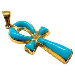 Ciondolo a forma di croce in oro giallo 14K con turchese Nature