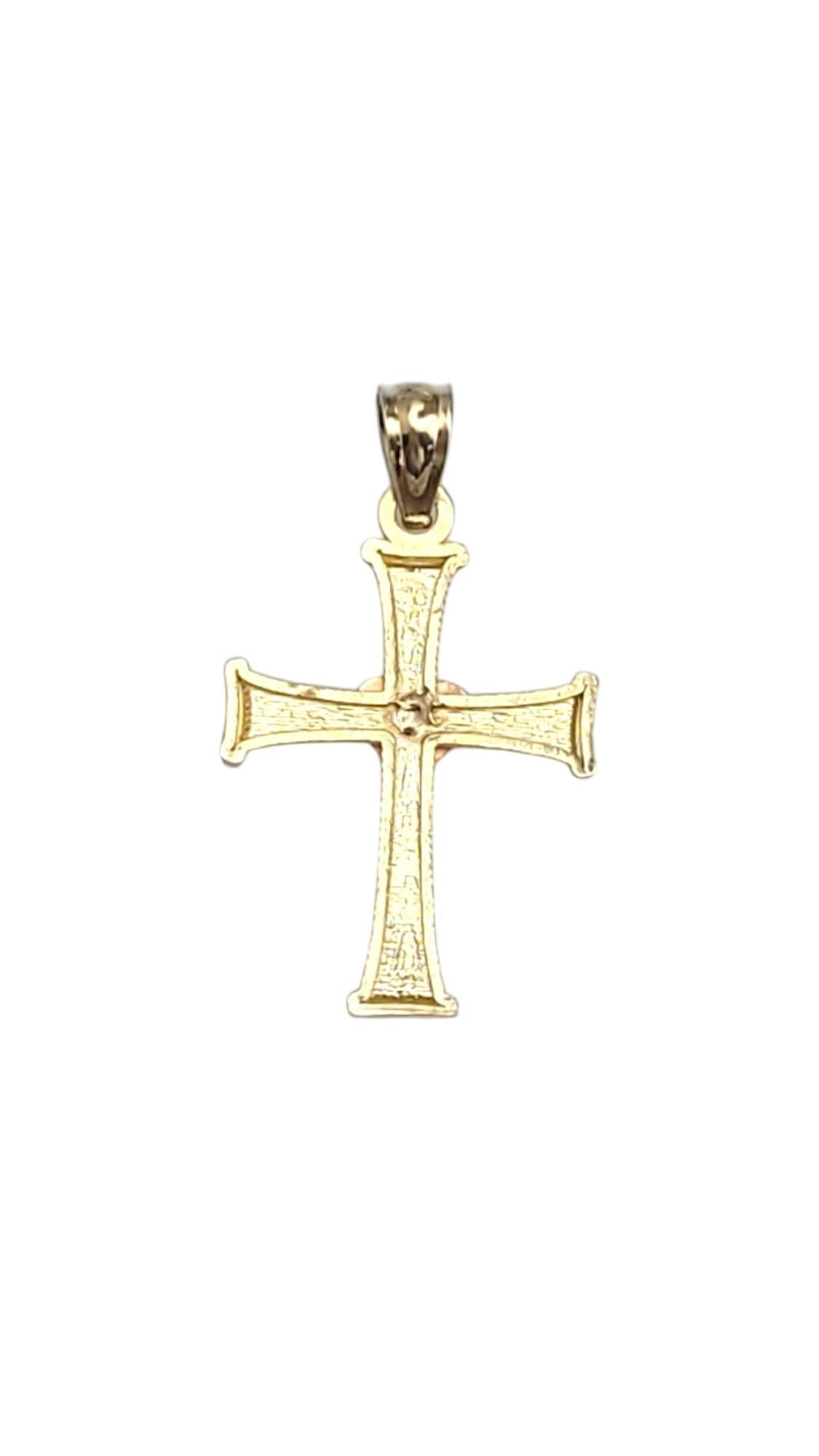 14K Yellow Gold Cross with Rose Gold Heart Pendant-

This elegant 14k yellow gold cross pendant combines timeless design with a radiant finish, making it a perfect symbol of faith and style. Its sleek, polished surface enhances any necklace,