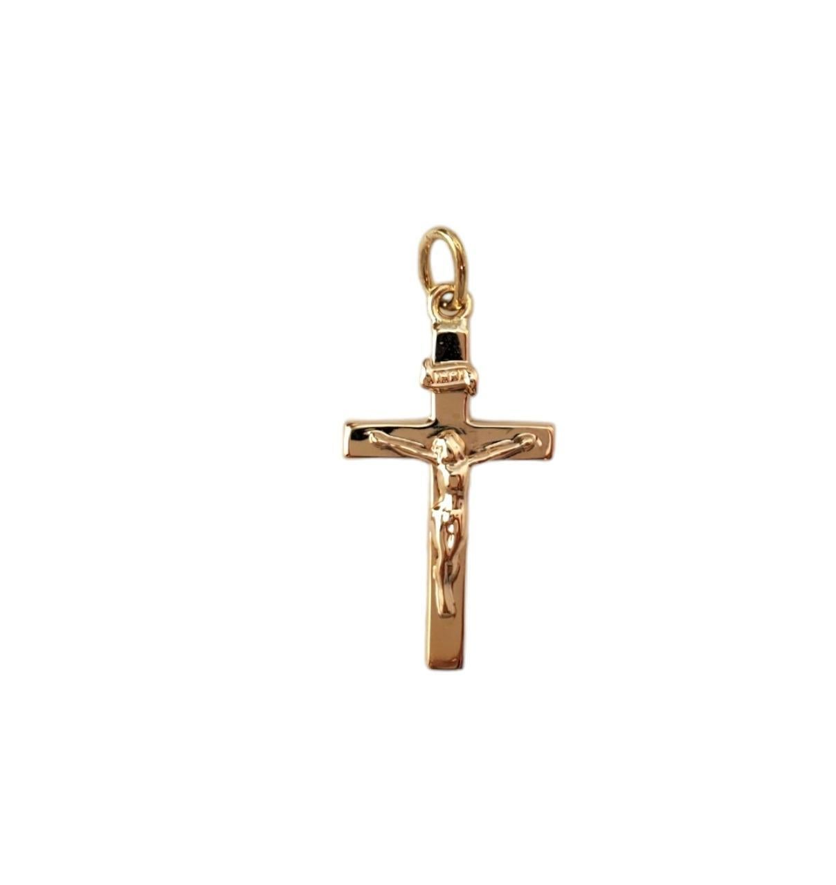 14K Yellow Gold Crucifix Pendant  -

This beautiful crucifix pendant is a meaningful addition to your collection. 

Size: 25.5mm X 14.2mm X 3.1mm

Weight: 0.6dwt. / 1.0 gr.

Marked: 14K

Very good condition, professionally polished.

Will come