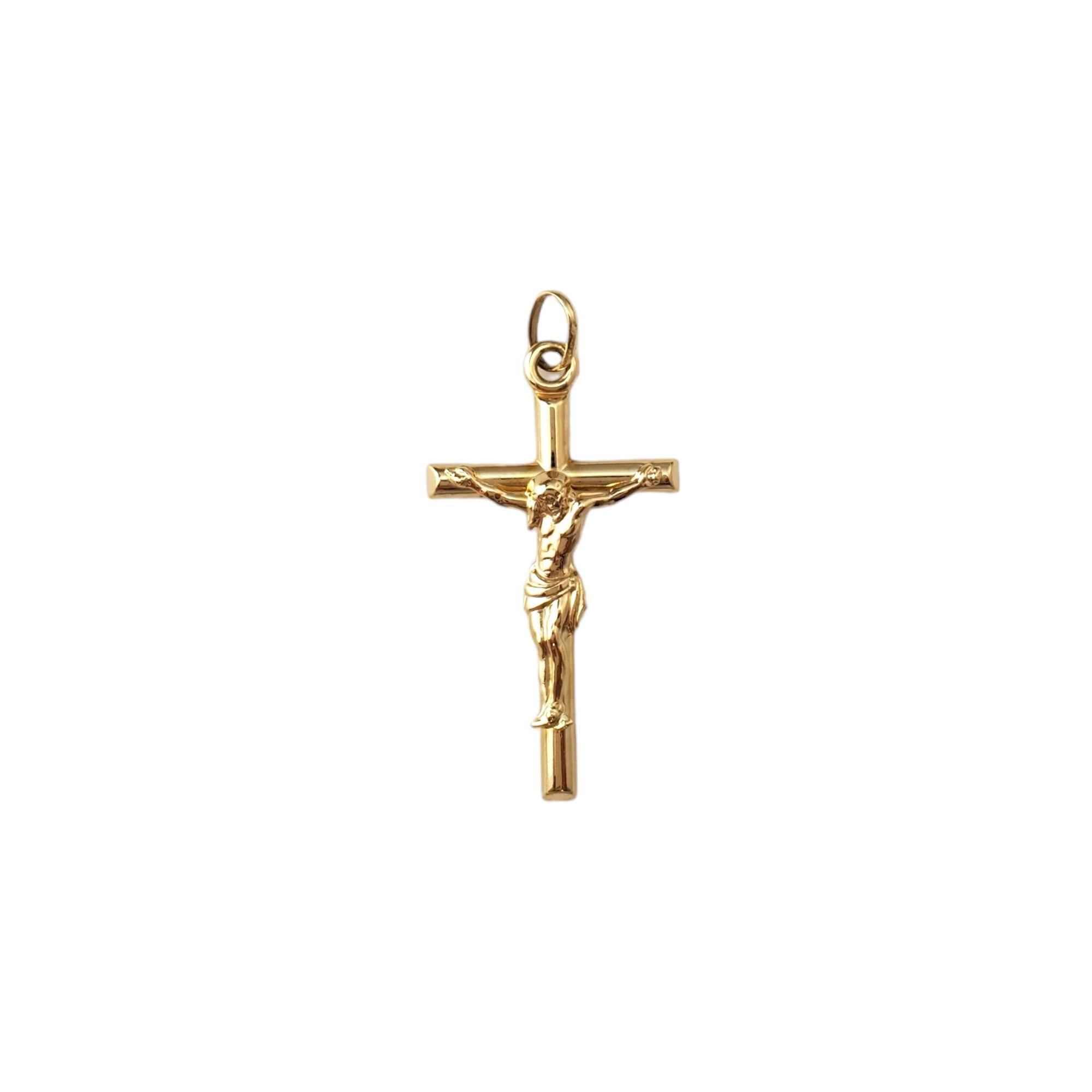 14K Yellow Gold Crucifix Pendant  -

This meaningful accessory was crafted in beautifully detailed 14K yellow gold. 

Size: 44.0mm X 24.8mm X 5.8mm

Weight: 2.1dwt. / 3.3gr.

Marked: 14KT

Very good condition, professionally polished.

Will come
