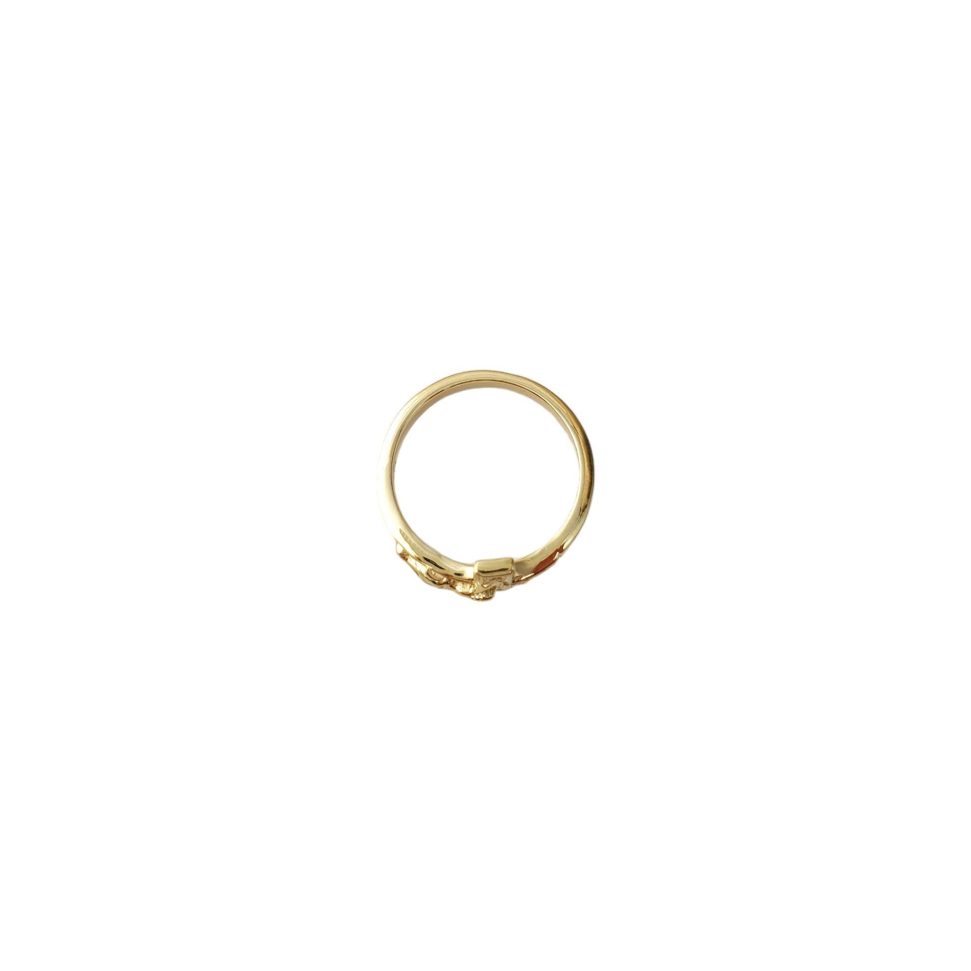 Vintage 14K Yellow Gold Crucifix Ring - 

This powerful symbol of faith is crafted in meticulously detailed 14K yellow gold. 
 
Ring Size: 5

Ring shank approx. 2mm

Weight: 1.8dwt. / 2.9 gr.

Marked: 14K

Very good condition, professionally