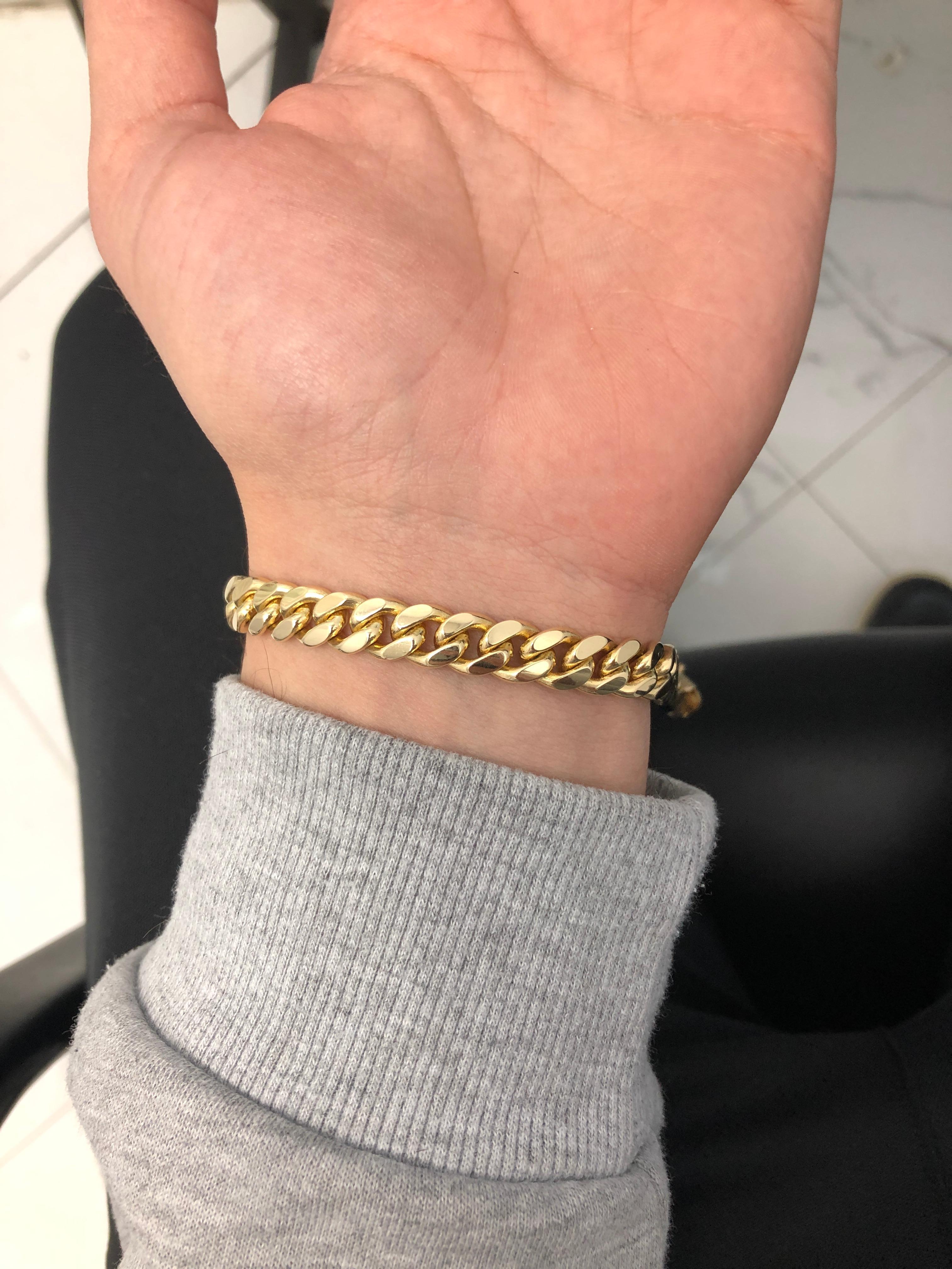 cuban link bracelet on wrist