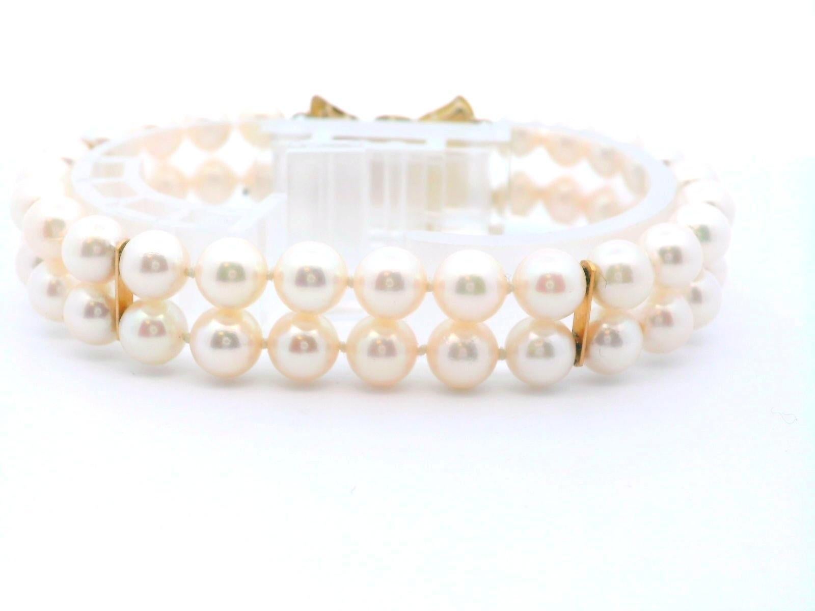 Donna Bracciale con doppio filo di perle coltivate in oro giallo 14k con chiusura a diamante in vendita