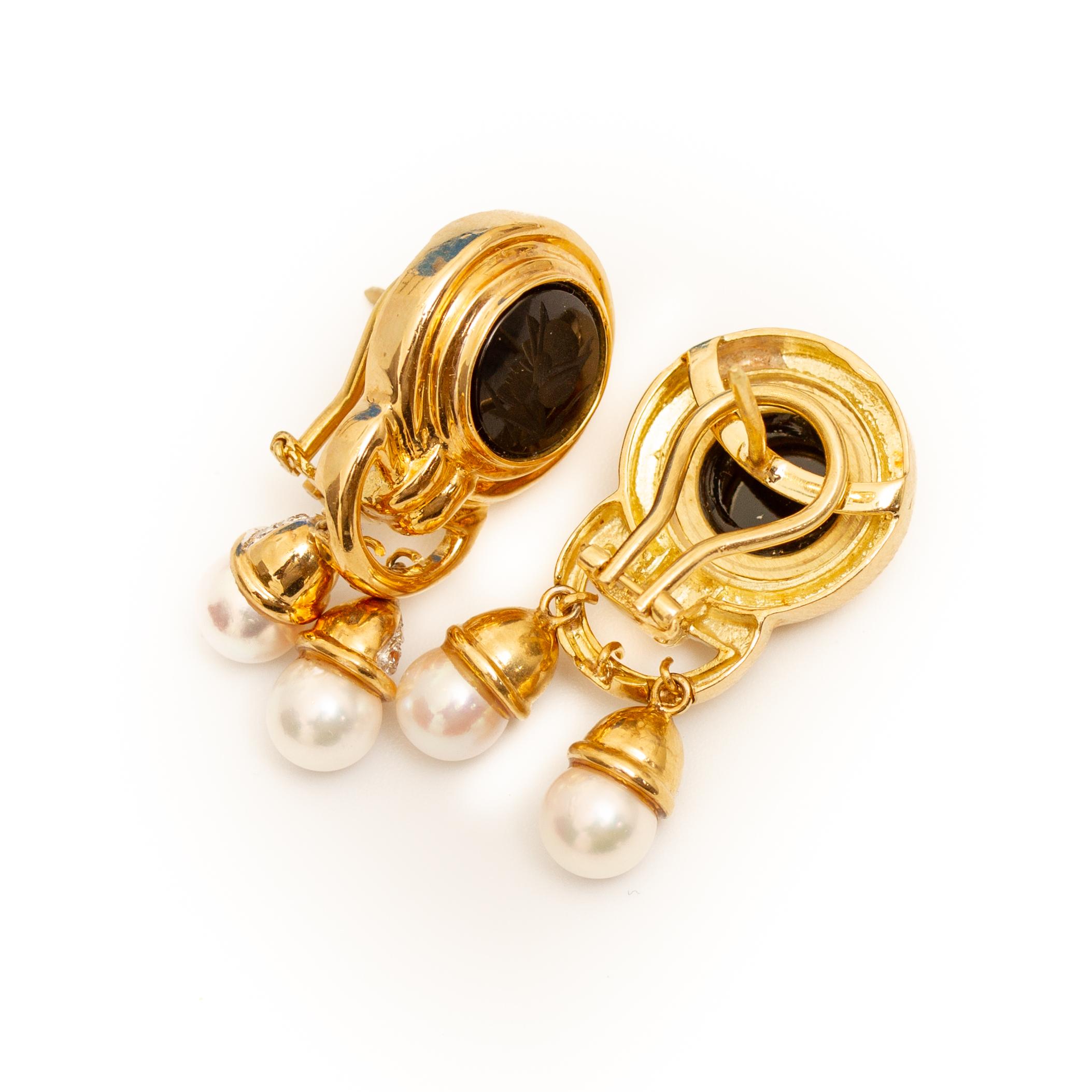 Offered is a pair of 14K Yellow Gold Cultured Pearl, Diamond and Black Onyx Intaglio Earrings