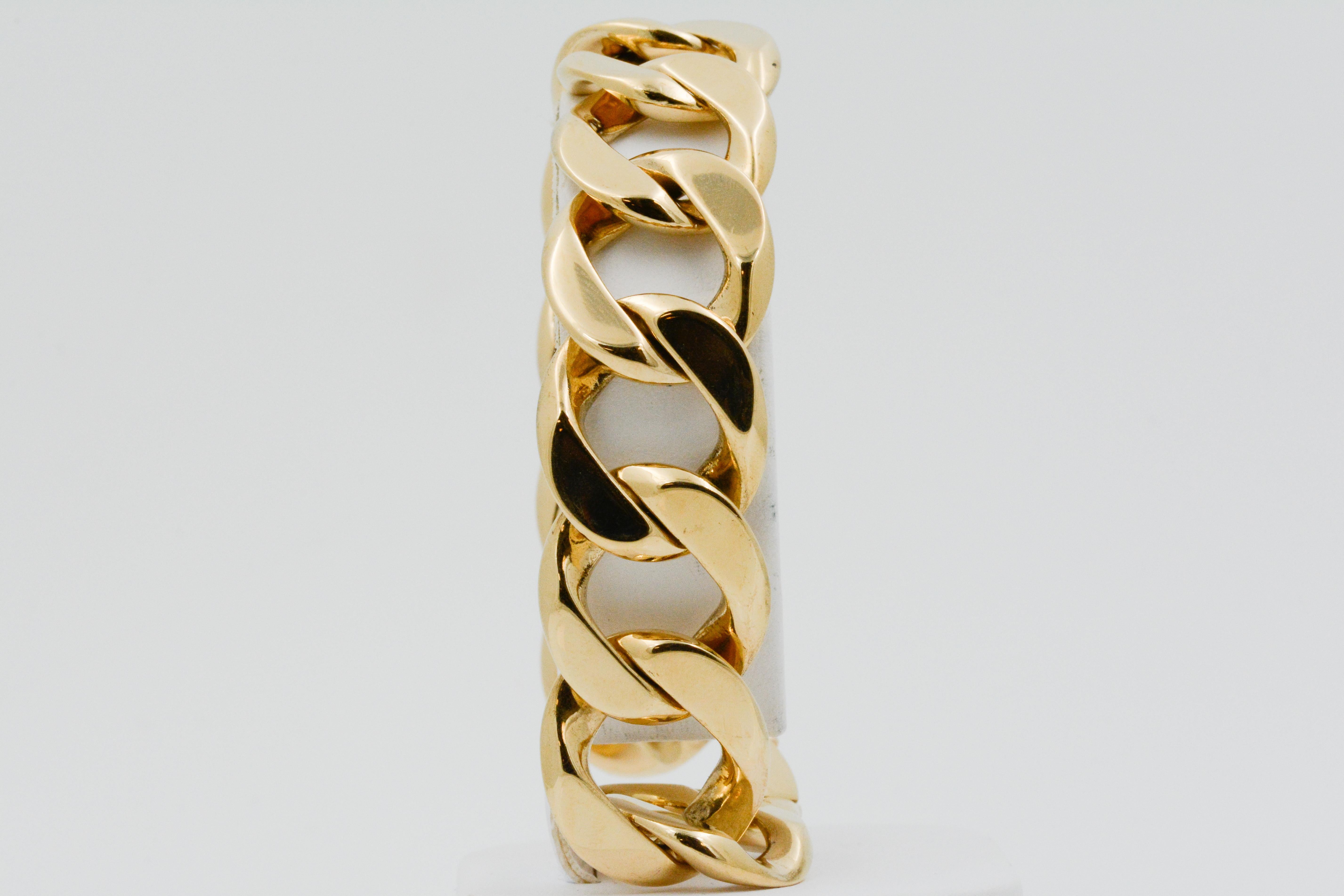 This 14k yellow gold curb link bracelet has a smooth glossy look, measuring at 7.5’ long with an integrated clasp. 