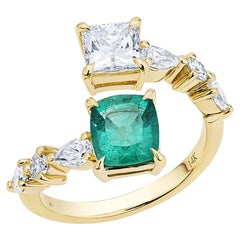 14K Yellow Gold Cushion Cut Emerald and Princess Cut Diamond Center
