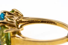 14k Yellow Gold Cushion Three Stone Swiss Blue Topaz and Peridot Ring