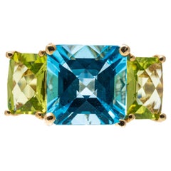 14k Yellow Gold Cushion Three Stone Swiss Blue Topaz and Peridot Ring