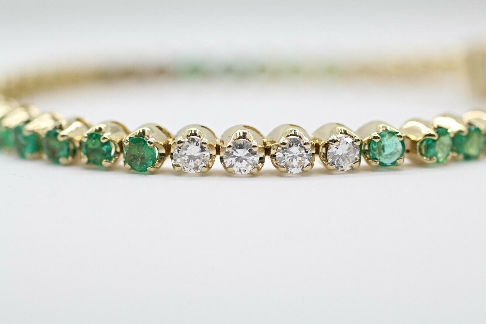  This is very beautiful 14k yellow gold custom made bracelet with very clean emeralds and round diamonds. This bracelet has 45 pieces of stones in approximately 4.00 carat total weight, E color and VS1 in clarity..
Specifications:
    main stone: