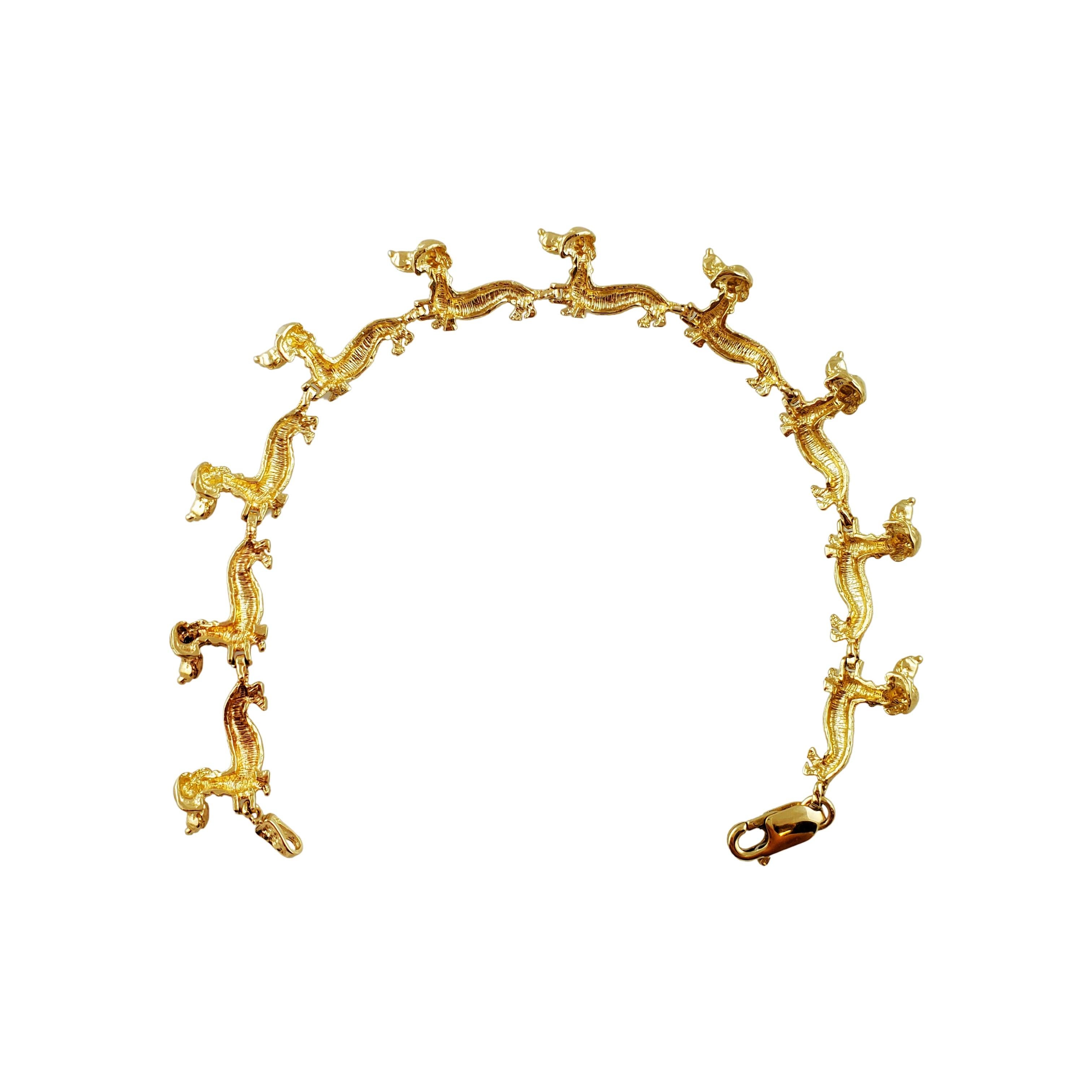 14K Yellow Gold Dachshund Link Bracelet

Adorable 14K yellow gold Dachshund Bracelet can become the perfect gift for any dog lover.

Size of Individual Dachshund: 20.5mm (from nose to tail) 10.5mm (from crown to feet)

Bracelet Size: 7'11