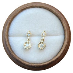 Orecchini in oro giallo 14k con diamanti naturali a forma di penzolo