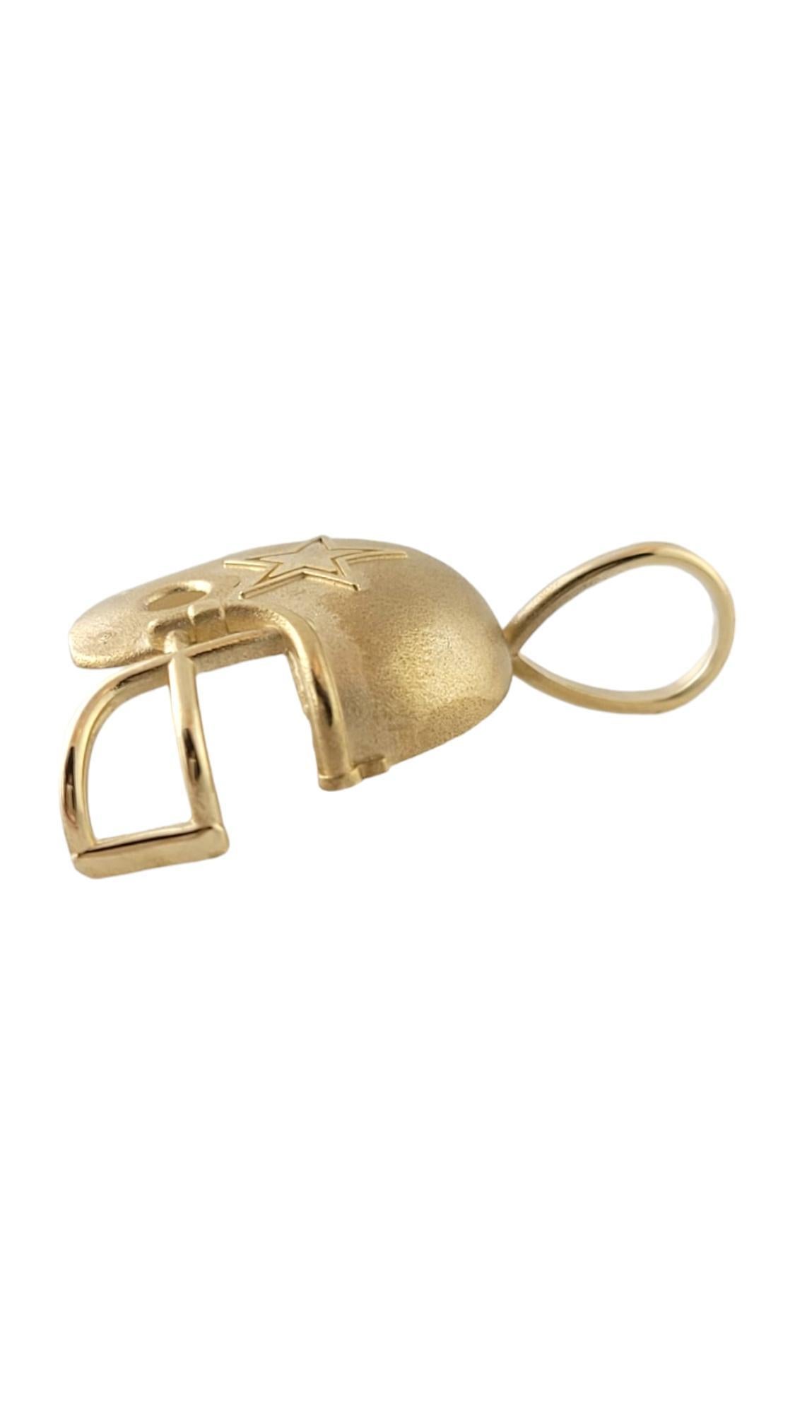 Vintage 14K Yellow Gold Dallas Cowboys Helmet Pendant
 
This beautifully detailed football helmet pendant is the perfect gift for a Cowboys fan in your life!

Size: 30.0mm X 21.0mm X 5.8mm

Weight: 1.6 dwt/ 2.4 g

Hallmark: TM C 1994 NFLP. 14K