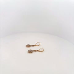 14K Yellow Gold Dangle Diamond Earrings with Round detailing