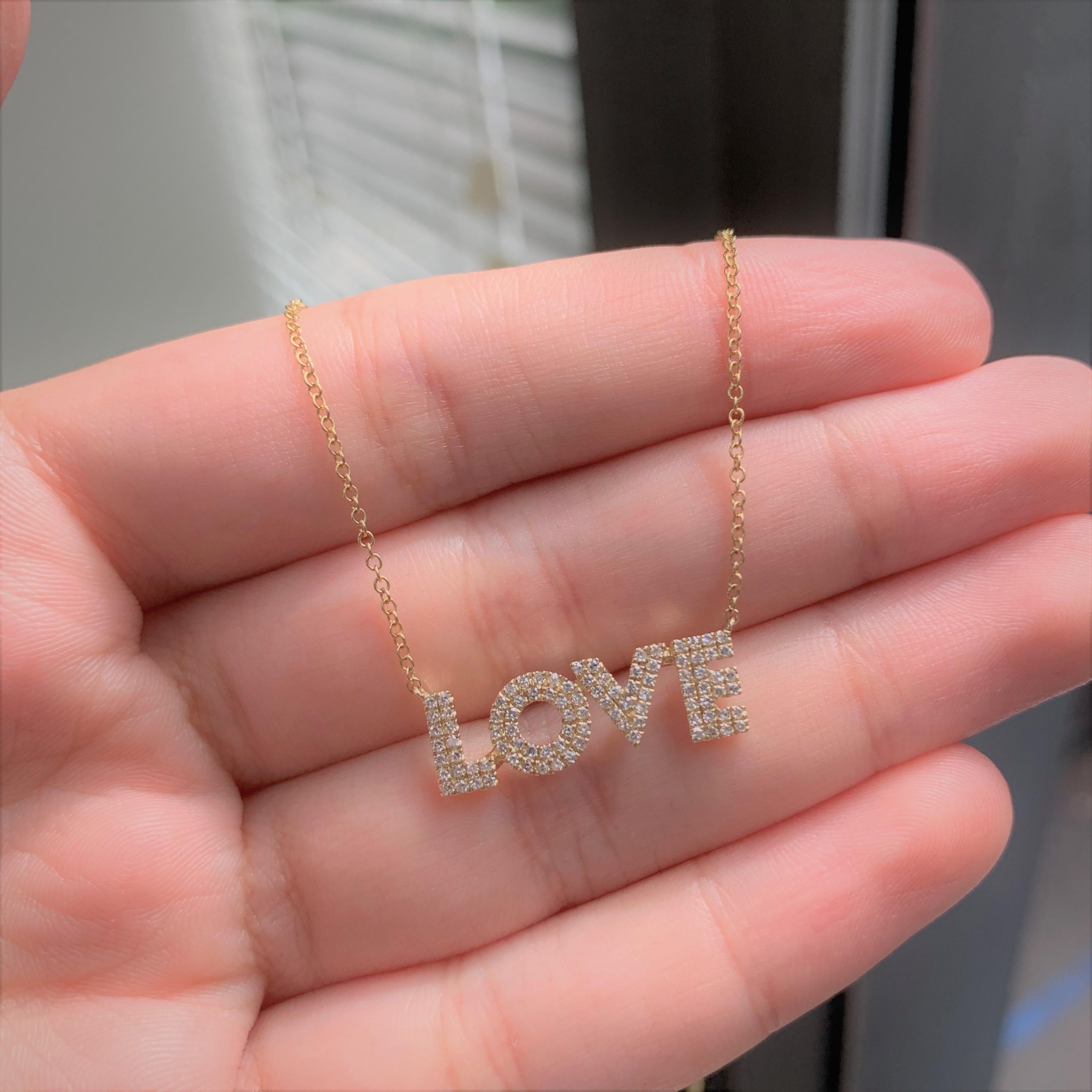 This Beautiful LOVE Necklace adds the perfect touch to your look! Crafted of 14K Gold this necklace features 0.27 carats of Round natural White Diamonds, on an adjustable 16