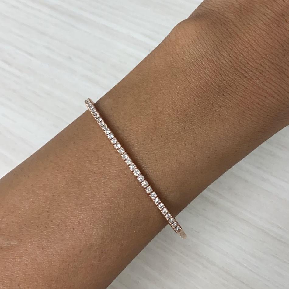 Quality Stackable Bangle: Made from real 14k gold and 39 glittering white approximately 0.99 ct. Certified diamonds, featuring a single row of white diamonds flexible diameter for comfort with a color and clarity of GH-SI
 Surprise Your Loved One
