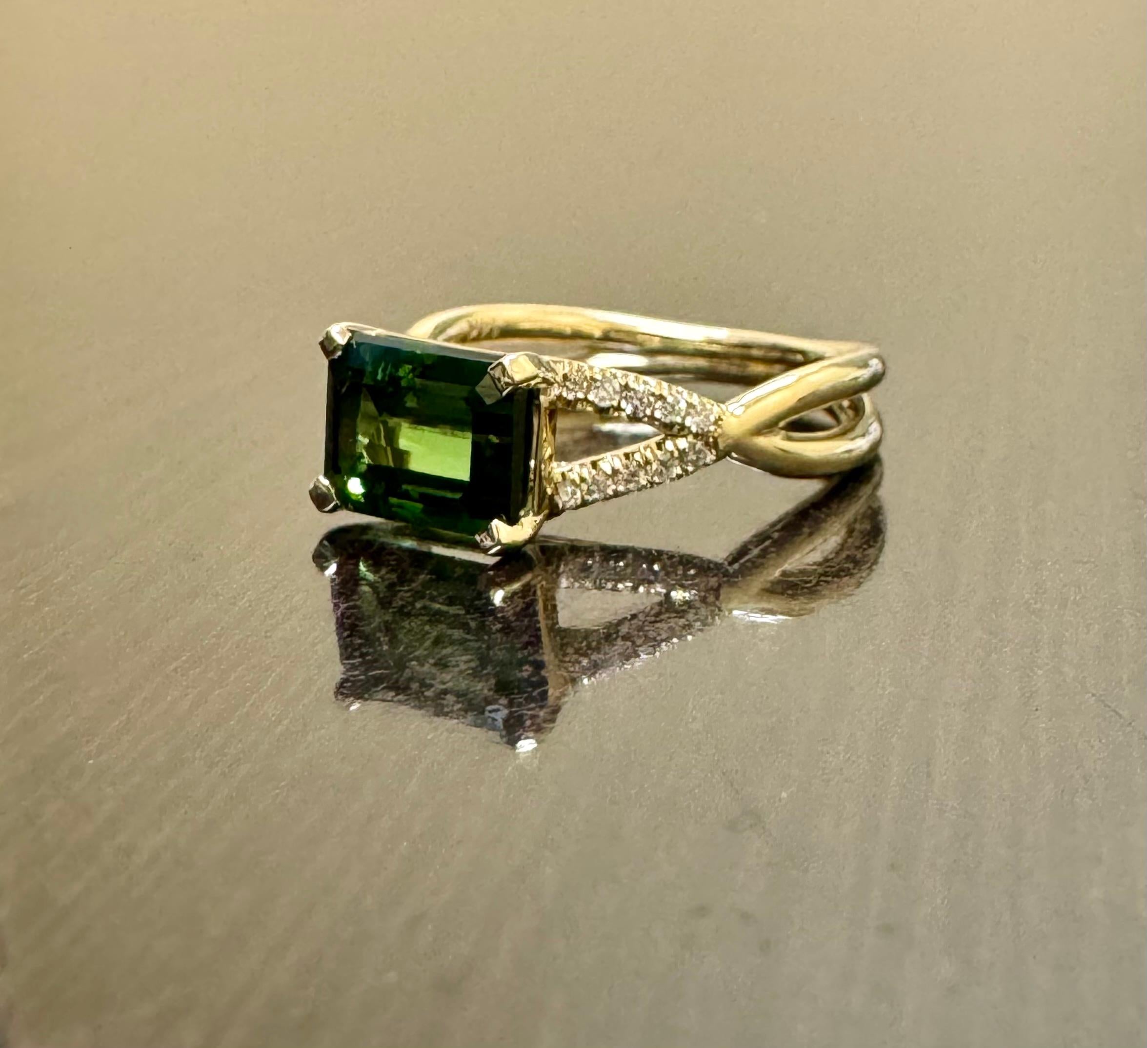 DeKara Designs Collection

Our latest design! An Elegant and Lustrous Elongated Emerald Cut Teal Tourmaline Handmade in 14K Yellow Gold.

Metal- 14K Yellow Gold, .583.

Stones- Genuine Emerald Cut Green Tourmaline 2.06 Carats, 20 Round Diamonds F-G