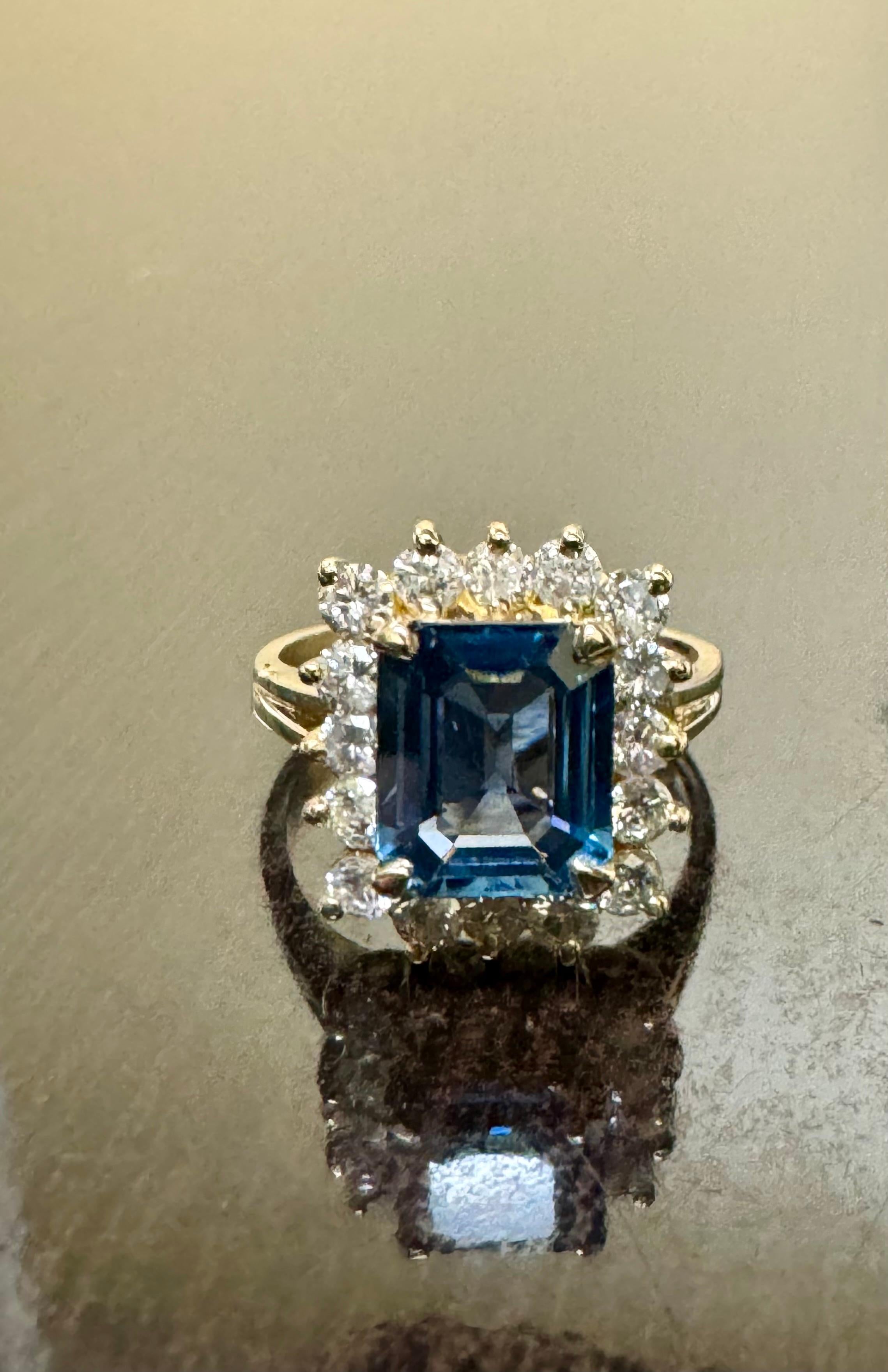 DeKara Designs Collection

Metal- 14K Yellow Gold, .583.

Stones- 1 Emerald Cut Blue Sapphire 2.54 Carats, 16 Round Diamonds G-H Color SI2 Clarity 0.96 Carats.  

Size- 6. FREE SIZING!!!!

Handmade 14K Yellow Gold Halo Diamond Emerald Cut Blue