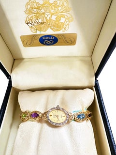 Orologio da donna Geneve Royale in oro giallo 14k con diamanti e pietre preziose