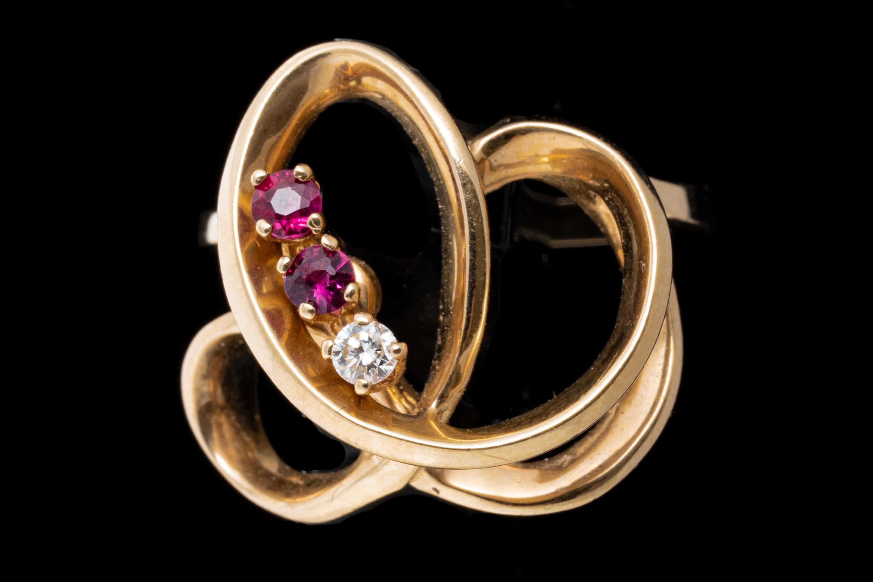 Women's 14k Yellow Gold Diamond And Ruby Accented Open Swirl Ring For Sale