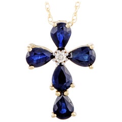 14 Karat Yellow Gold Diamond and Sapphire Cross Pendant Necklace