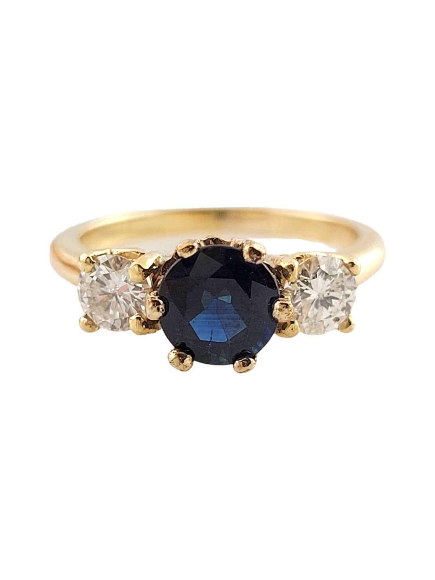 Vintage 14K Yellow Gold Diamond and Natural Sapphire Ring Size 4.75

This gorgeous sapphire and diamond ring is set with two round brilliant diamonds and one larger deep blue genuine sapphire.

Round brilliant diamonds are approximately .25 carats