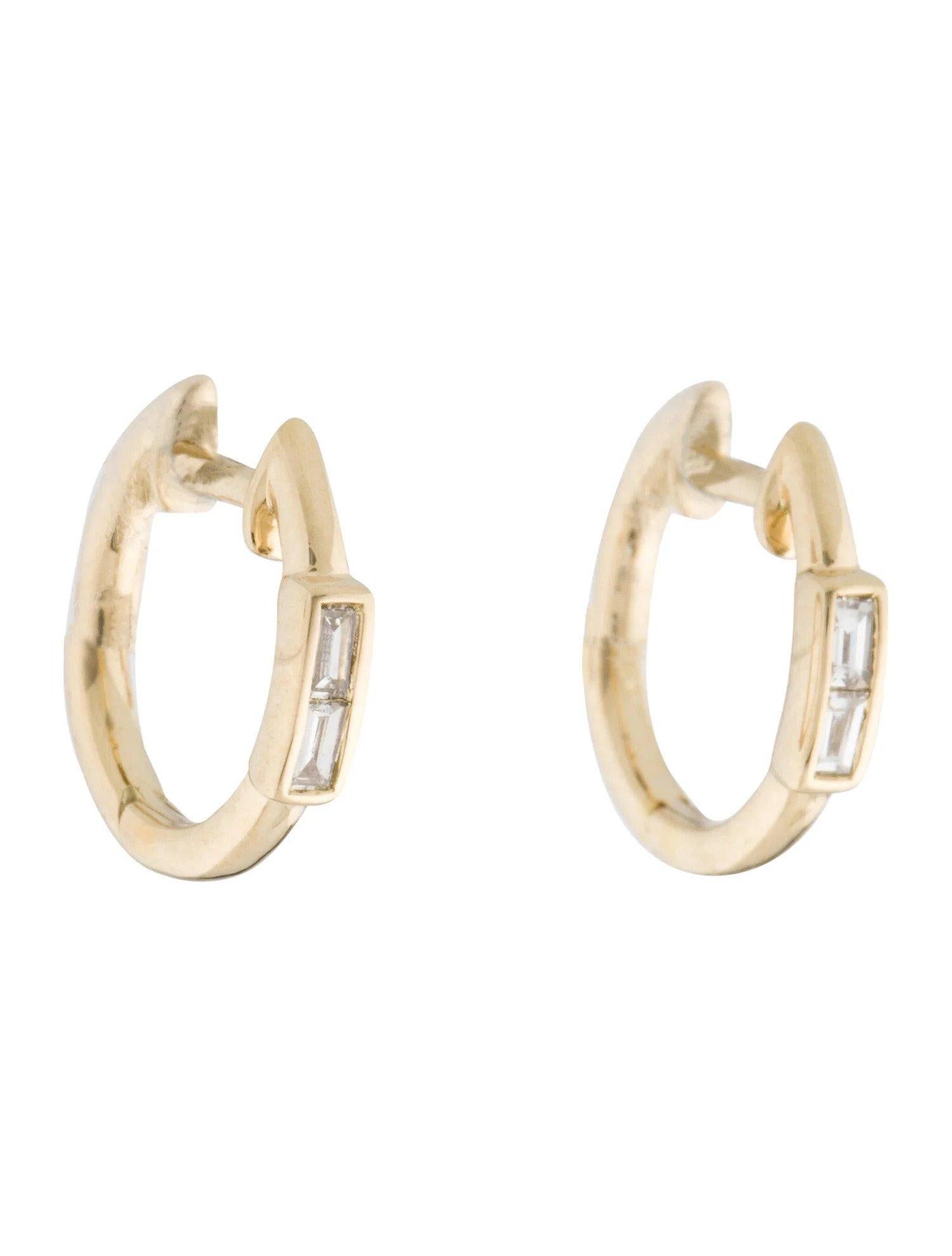 This pair of Diamond Huggie Hoop Earrings by Joelle Jewelry is sure to be your new favorite. With shimmering 0.11 ct. of baguette-cut diamonds adorning the Huggie, they create the perfect amount of sparkle for  any look. Crafted in 14k Gold with