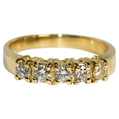 Anillo de oro amarillo de 14 quilates con diamantes 0,50 ct