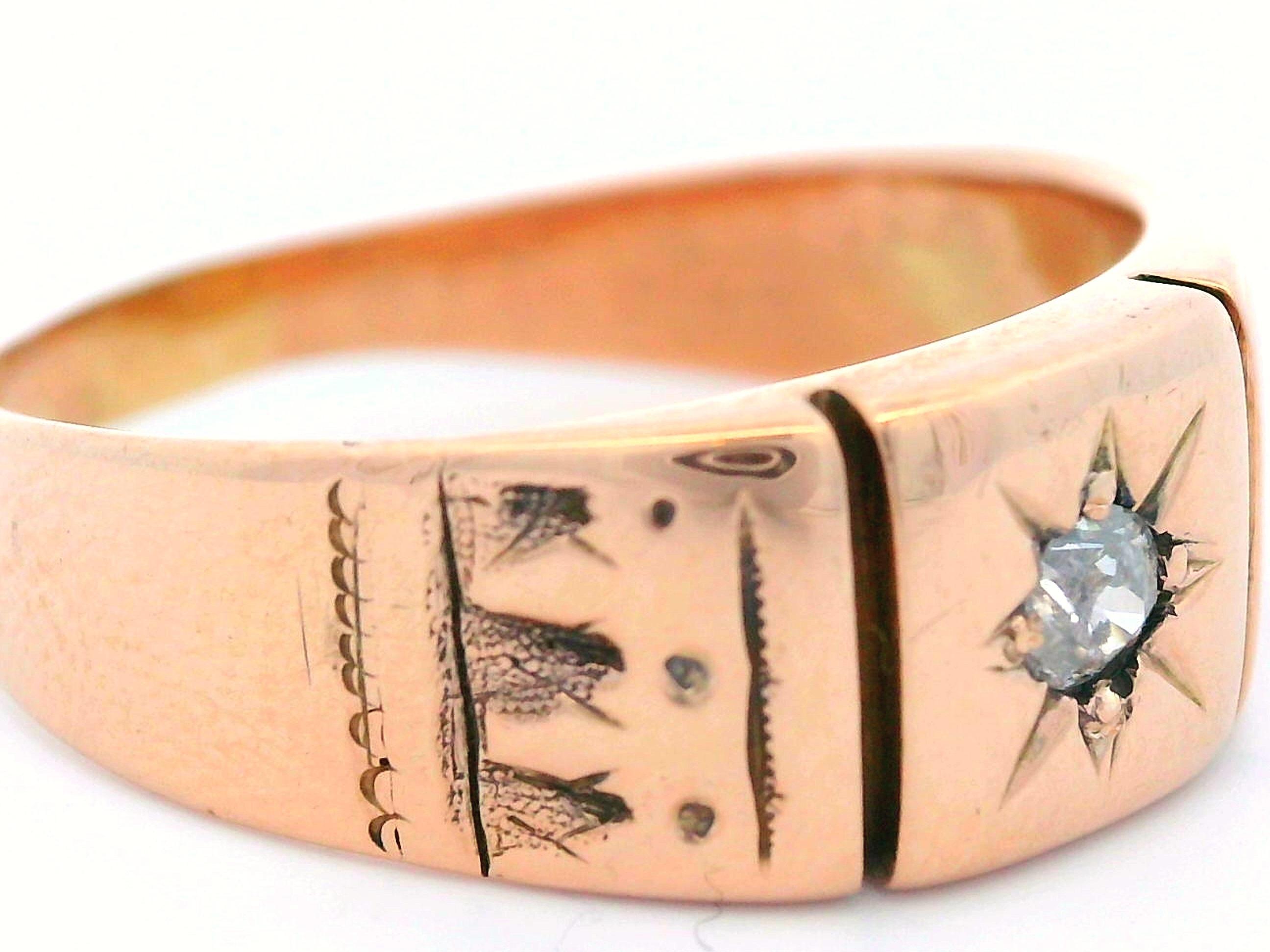 This stunning 14k yellow gold and diamond ring comes from the 1890 Victorian era. The center of the ring showcases a bright white star set Old European Cut diamond . The ring features deep engravings on both sides of the diamond that section the