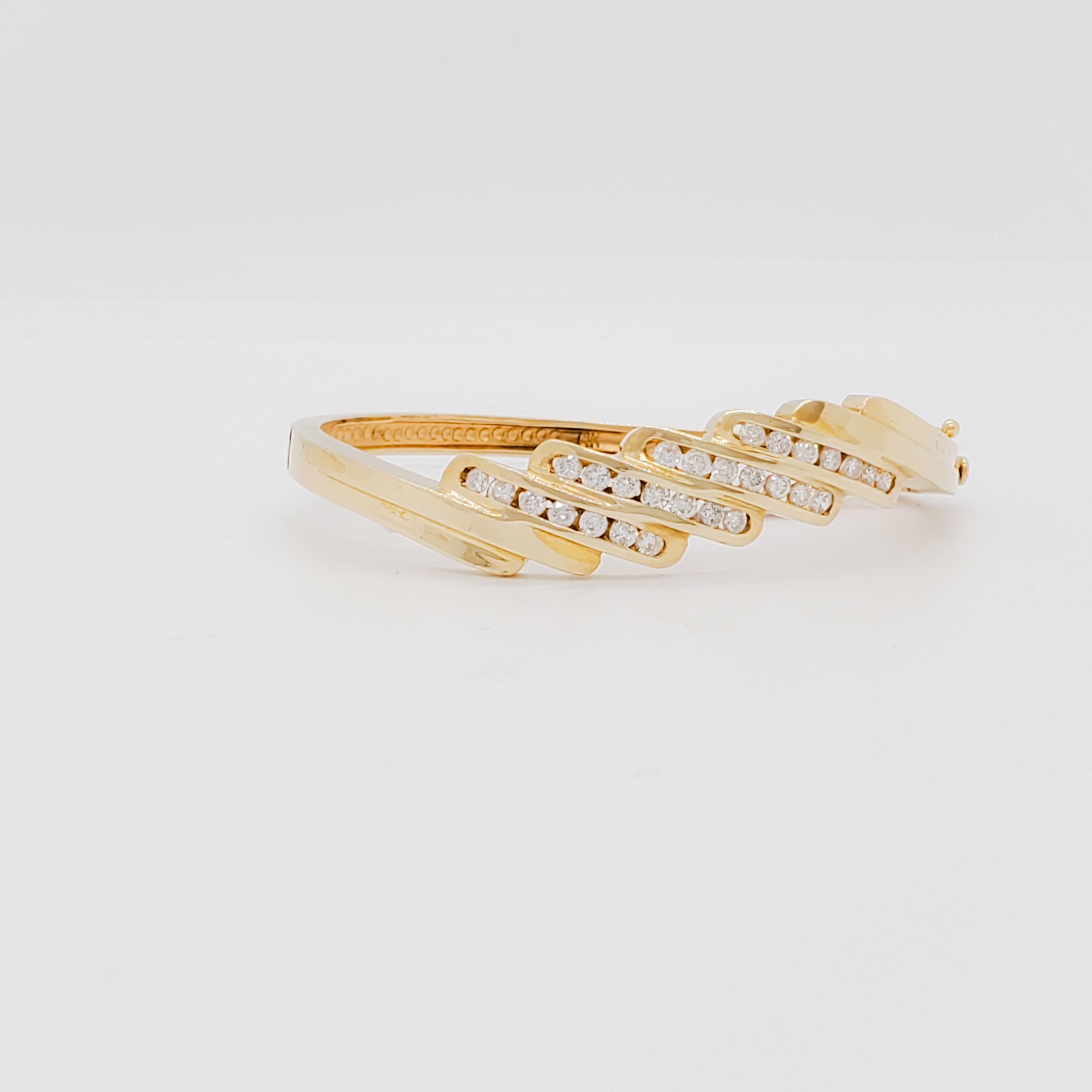 Beautiful 14k yellow gold bangle with 1.50 ct. good quality, white, and bright diamond rounds.  Handmade.