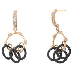 Boucles d'oreilles pendantes en or jaune 14K avec diamants et onyx noir