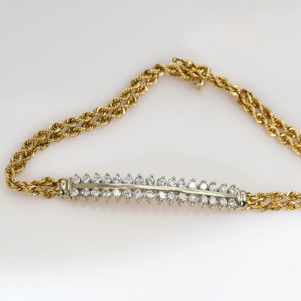 14k Yellow Gold Diamond Bracelet
Rope style chain
Weighs 8.8 grams with a TDW of 1.00ct
SI1-SI2 Clarity
F-H Color
Bracelet Length is 7in 
