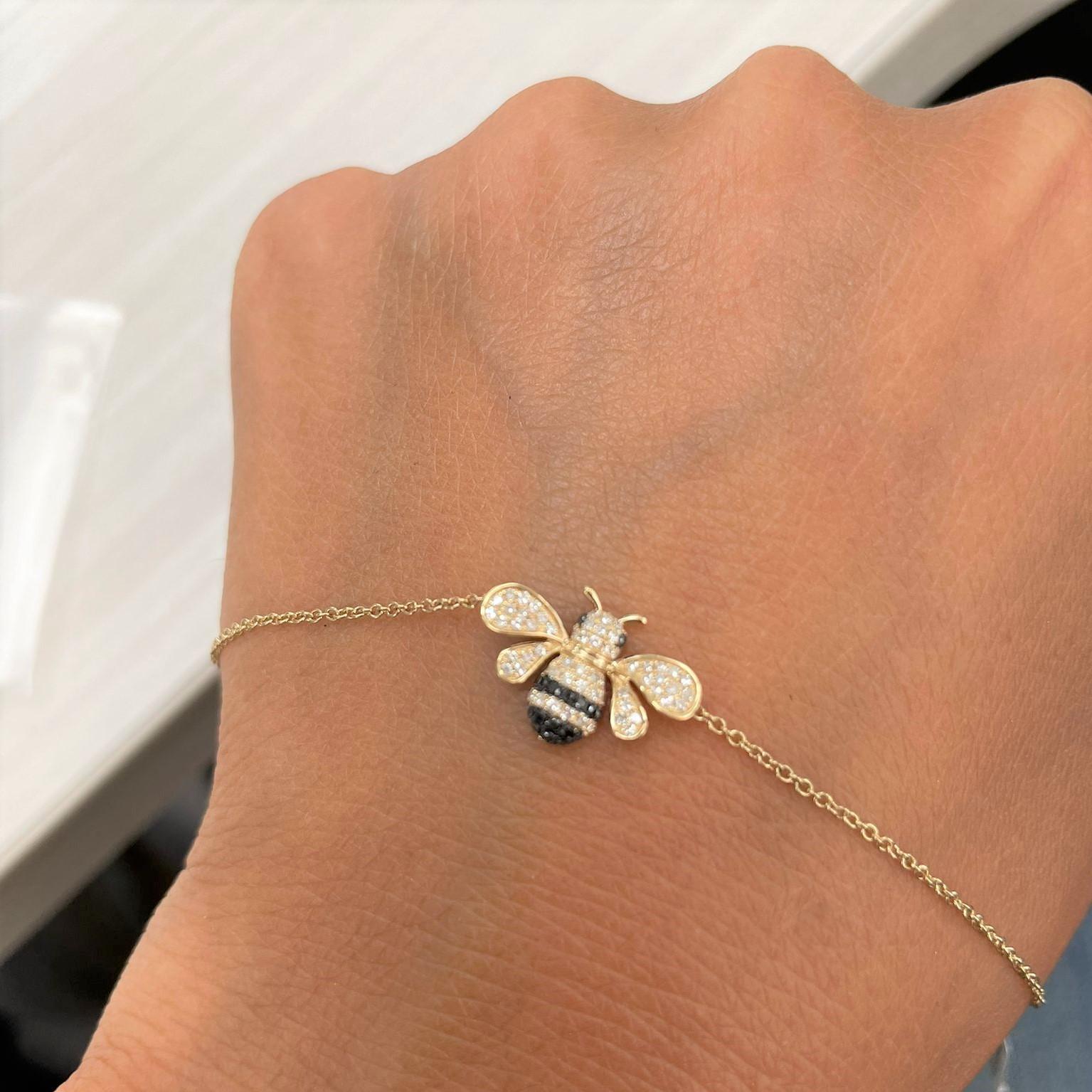 Diamond Bumble Bee Bracelet: Focused on design and detail, this adorable diamond bumble bee bracelet will have heads turn! Crafted of 14K Gold features 0.14ct Natural Diamonds and 0.06 cts of Black Diamonds and is offered in 14k yellow or rose gold.