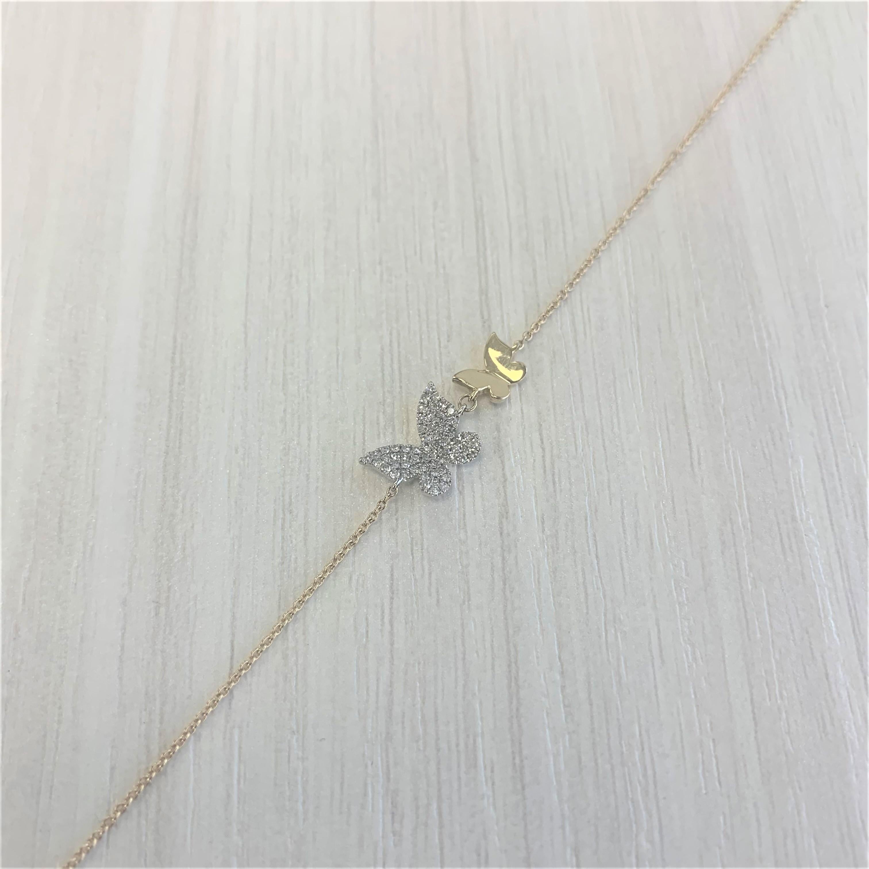 Double Butterfly Pave Chain Design Bracelet: This beautiful and eye-catching Butterfly Bracelet is made of 14K Gold and features 0.15 carats of natural round white Diamonds; the bracelet length is adjustable from 6.75