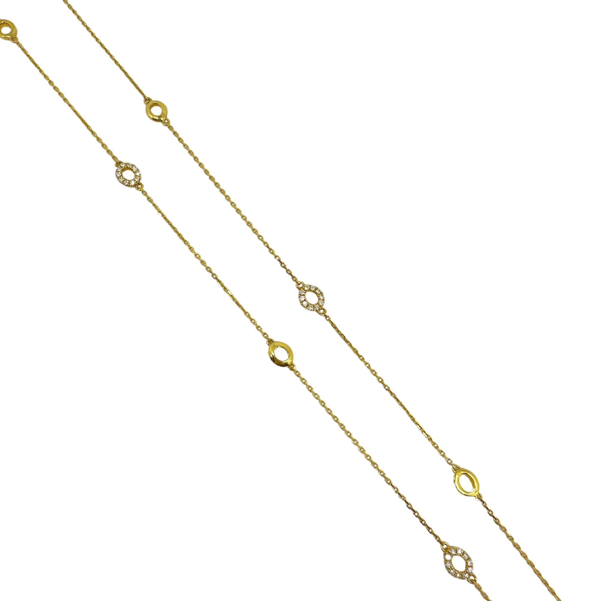 Diese elegante 14K Yellow Gold Diamond By the Yard Chain Necklace besticht durch zarte Diamanten von insgesamt 0,33 Karat, eingefasst in eine zeitlose 22-Zoll-Kette. In gutem Zustand mit einigen kleinen Oberflächenabnutzungen, zeigt es die Qualität