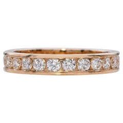 Fascia per l'eternità con diamanti incastonati in oro giallo 14k