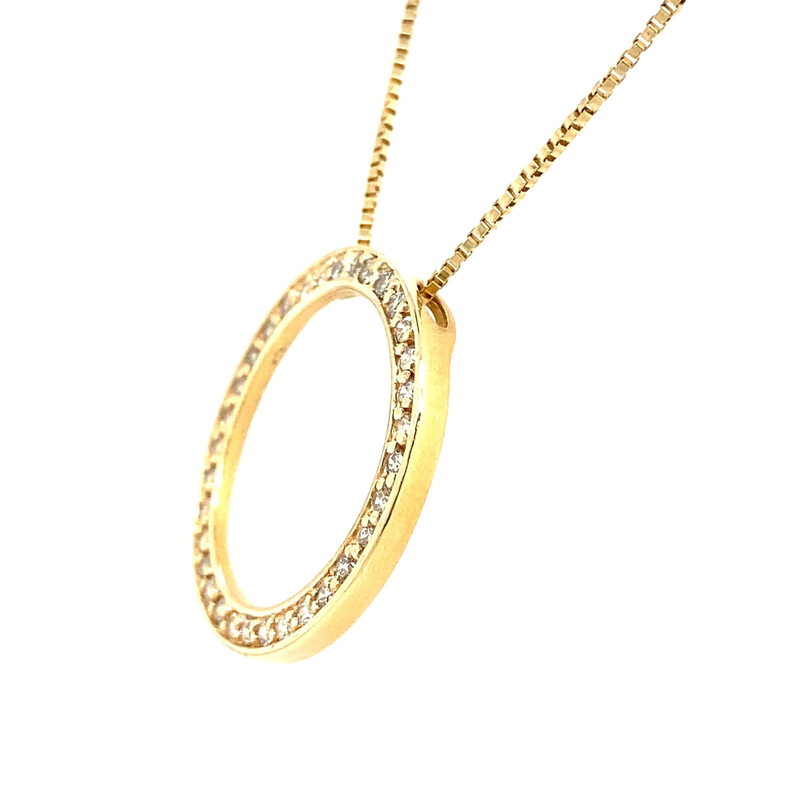 The circle has long been associated with undying devotion and love, as a circle has no end. While wedding bands might be the most common use of the unending circle, this diamond-set pendant has the same loving meaning. This 14K yellow gold version