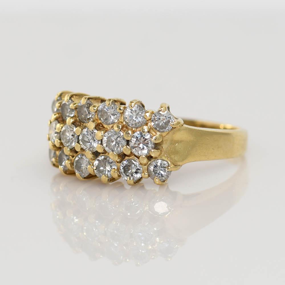 14k Yellow Gold Diamond Cluster ring.
There is three rows of RBC Diamonds with .70tdw.
Clarity ranges from i1-i2, and Color H-I-J.
Stamped 14k and weighs 3.8gr
size 5 3/4
Can be sized one size up or down for additional fee