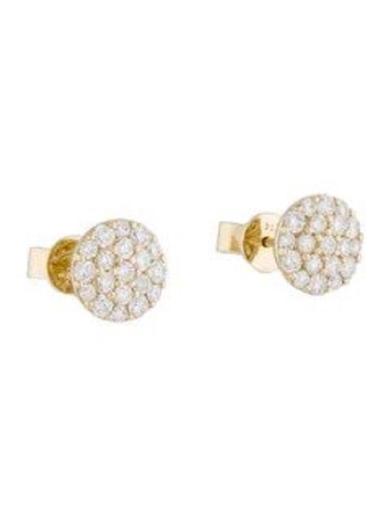 These Beautfiul and Shimmering Diamond Cluster Stud Earrings are crafted of 14K Gold and feature 0.72cts of Round White Diamonds, with butterfly push-back closure.
 
 14K Yellow Gold
 0.72cts White Diamonds
 Shape Round
 Color GH
 Clarity SI1
