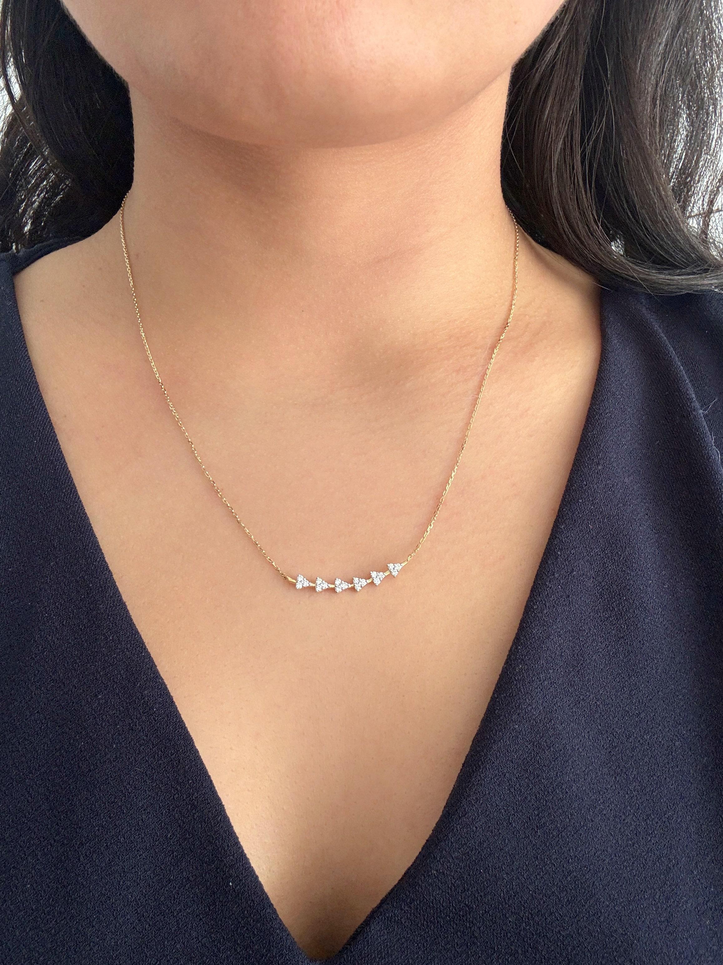 This diamond clusters bar pendant is a fashionable piece that is perfect for layering your necklaces for an everyday style. Crafted from genuine diamonds for maximum sparkle and shine, this timeless bar pendant offers an elegant and classic look.