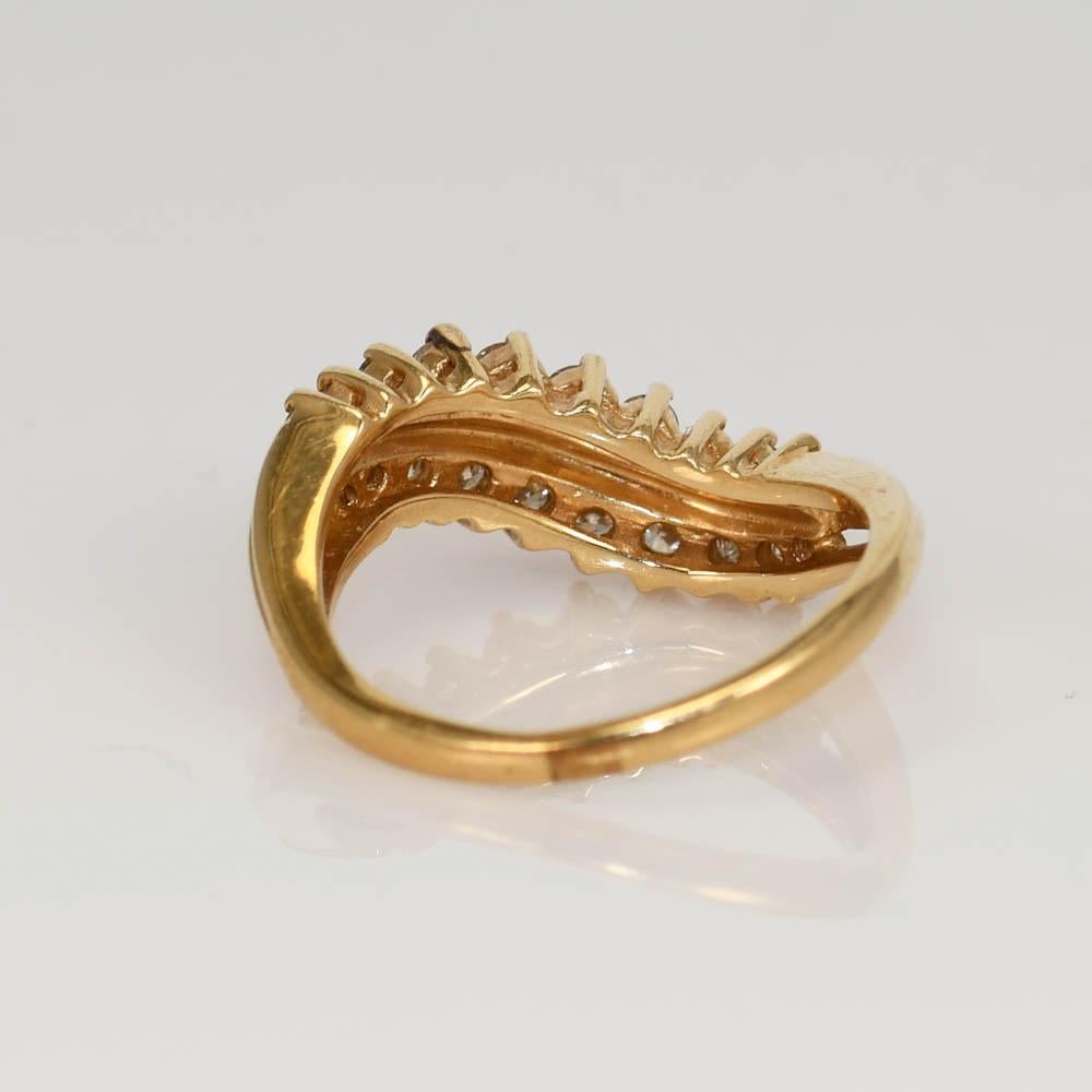 14k Diamond Cocktail Ring set in Yellow Gold. 
There is .50tdw in Round Brilliant Cuts.
Ranging from SI1-SI2 Clarity, J-K-L Color.
Stamped and Tests 14k, weighs 4 grams.
Size 7.
Can be sized up or down one siz.