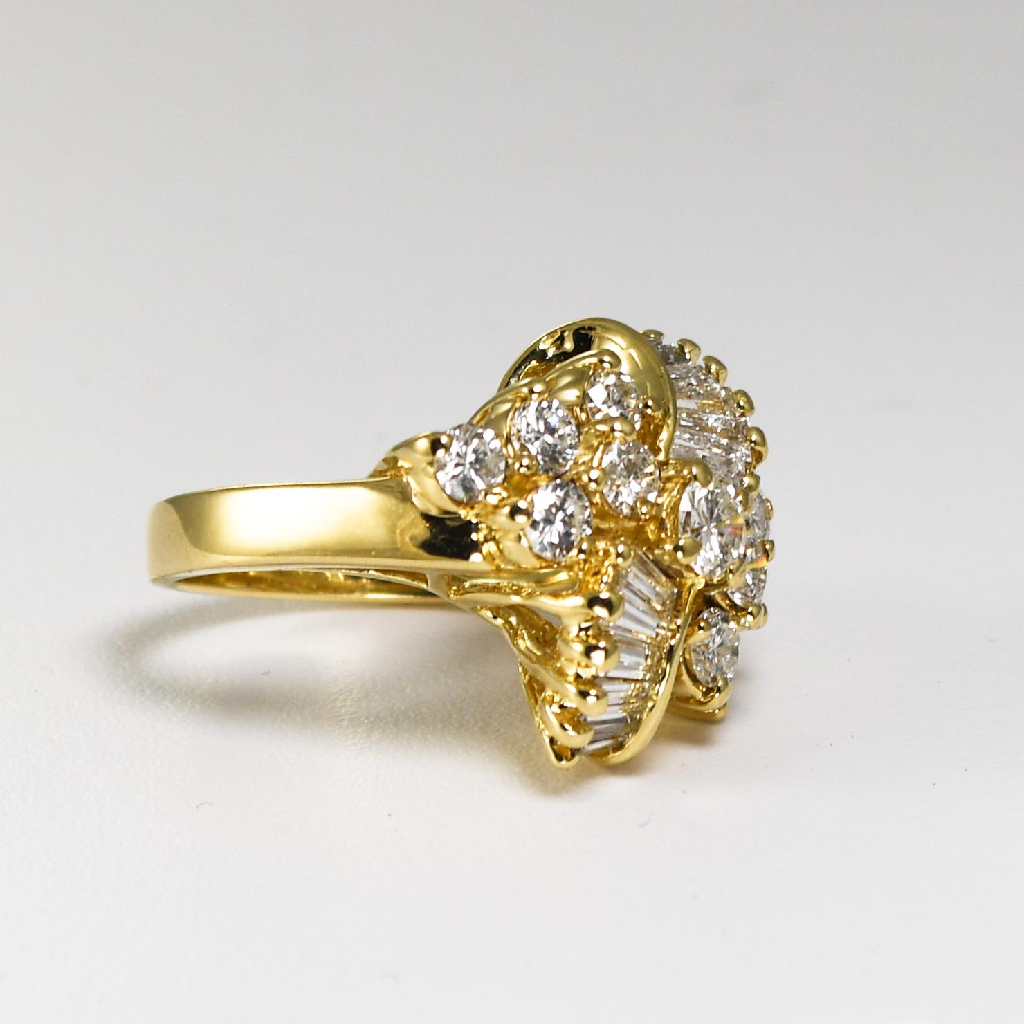 Ladies' 14k yellow gold and diamond cocktail ring.
Stamped 14k and weighs 5.5 grams gross weight.
The diamonds are a mix of round brilliant cuts and baguette cuts, 1.00 total carats.
The center diamond is Si clarity, but most of he others are Vs
