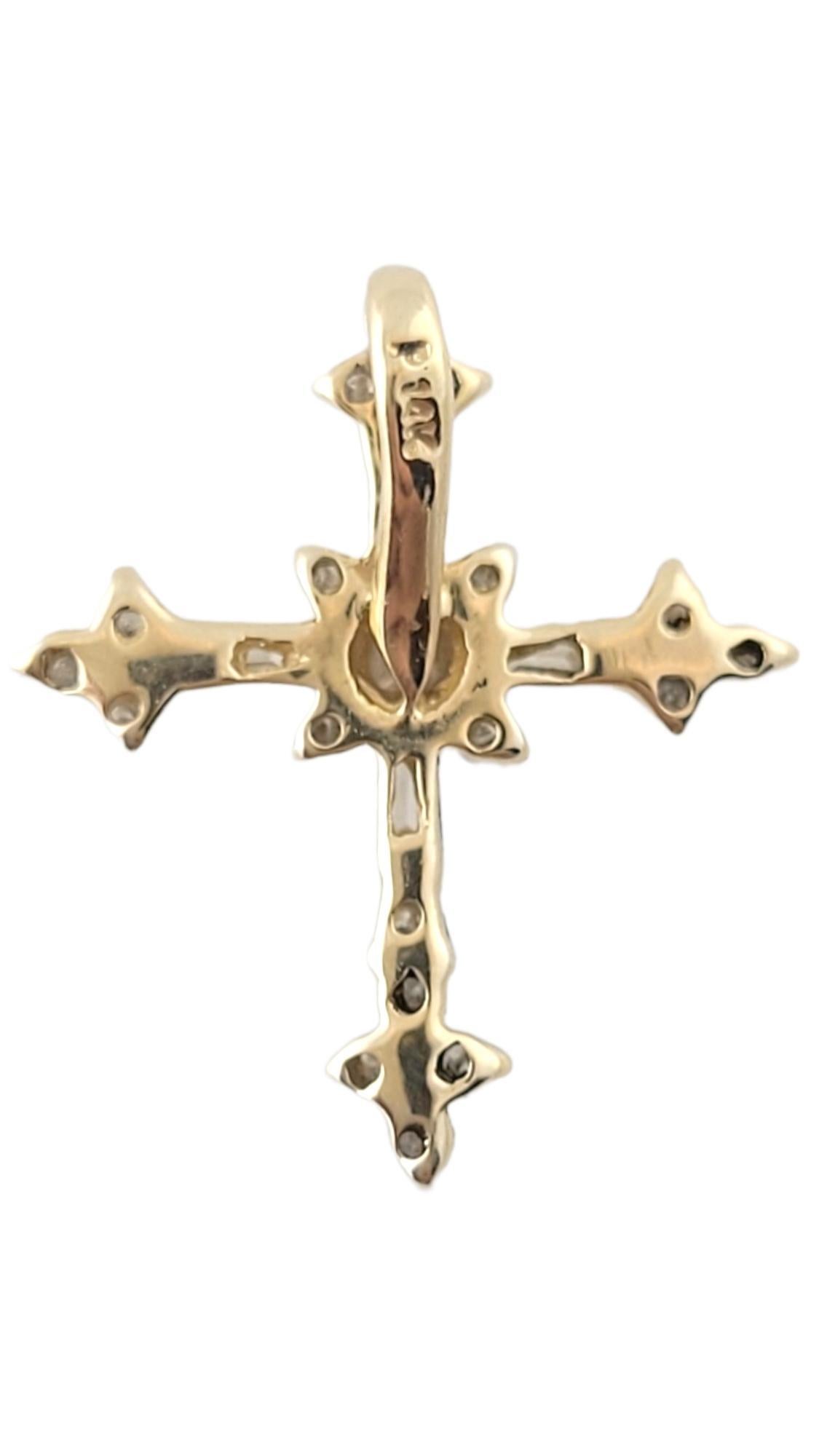 Vintage 14K Yellow Gold Diamond Cross Pendant

This stunning cross pendant is crafted from 14K yellow gold and features 14 found brilliant cut diamonds and 4 baguette cut diamonds for a beautiful sparkle!

Approximate total diamond weight: .13