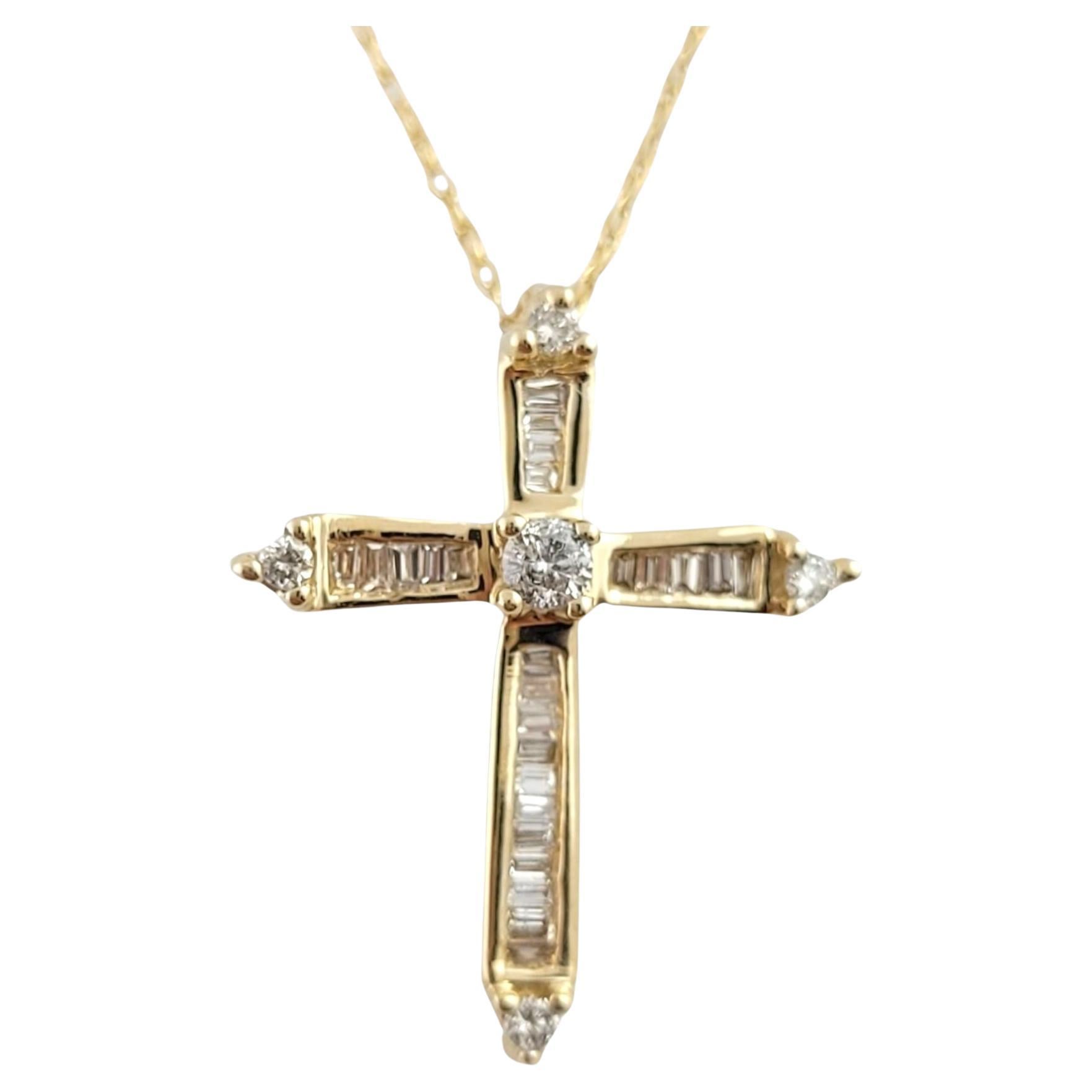 This gorgeous 14K gold chain necklace features a beautiful cross pendant decorated with 25 sparkling, baguette cut diamond and 5 round cut diamonds for a perfect finish!

Approximate total diamond weight: .29 cts

Diamond clarity: SI1-I1

Diamond