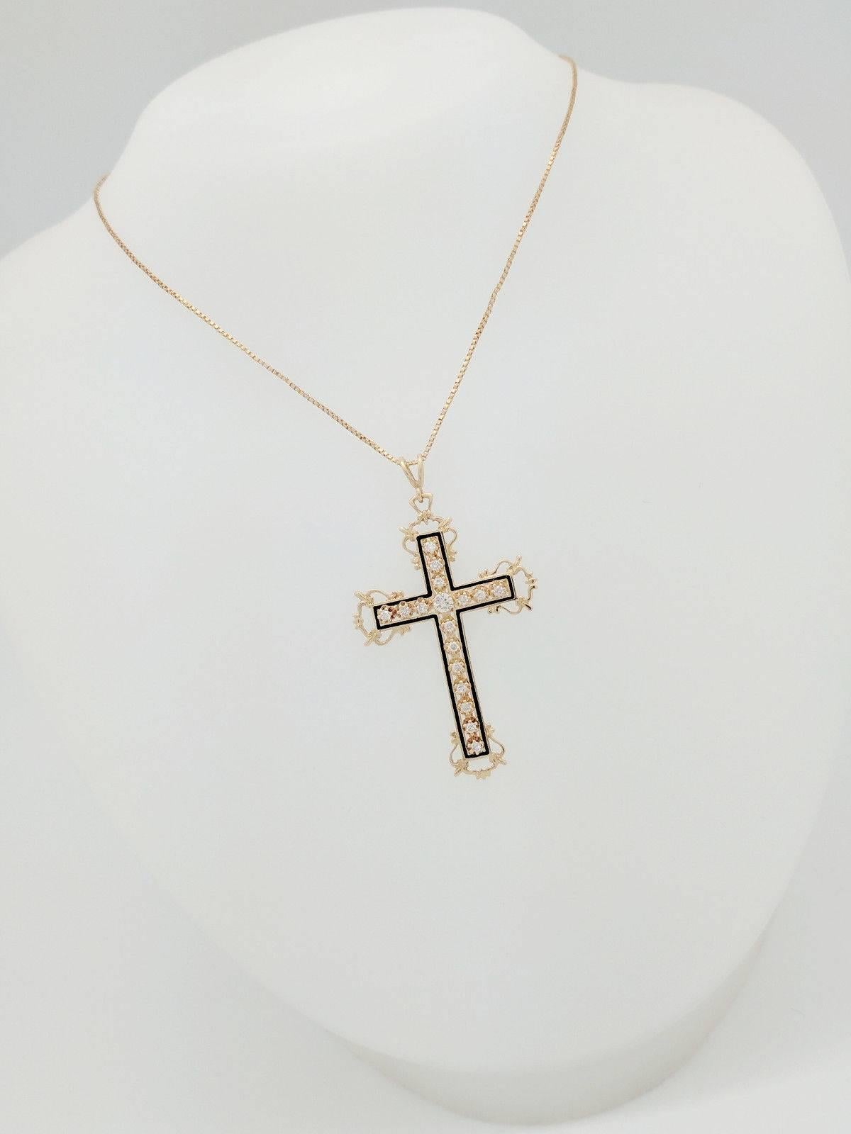 gold and diamond cross pendant